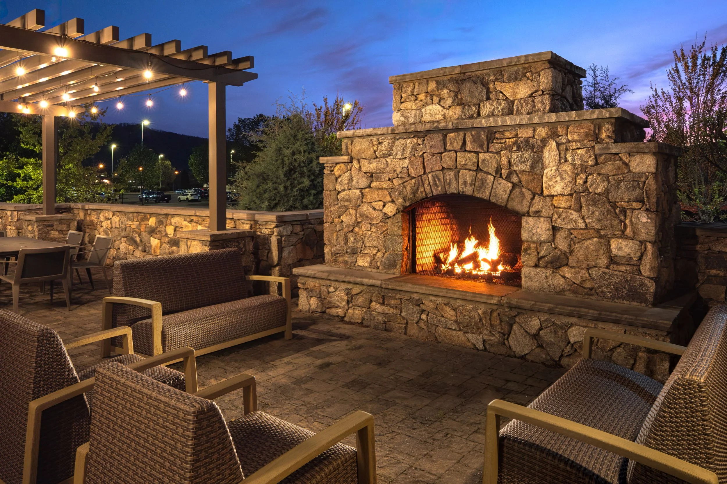  ORIGINAL FILENAME:  4920_TYSCP_Courtyard_outdoorfireplace.jpg  FILE NAME:  Outdoor Fireplace  PHOTO PLACEMENT TAG:  Search in DAC for: Features  CAPTION:  Outdoor Fireplace  MARKETING CAPTION:  The outdoor fireplace patio features stonework, lounge 