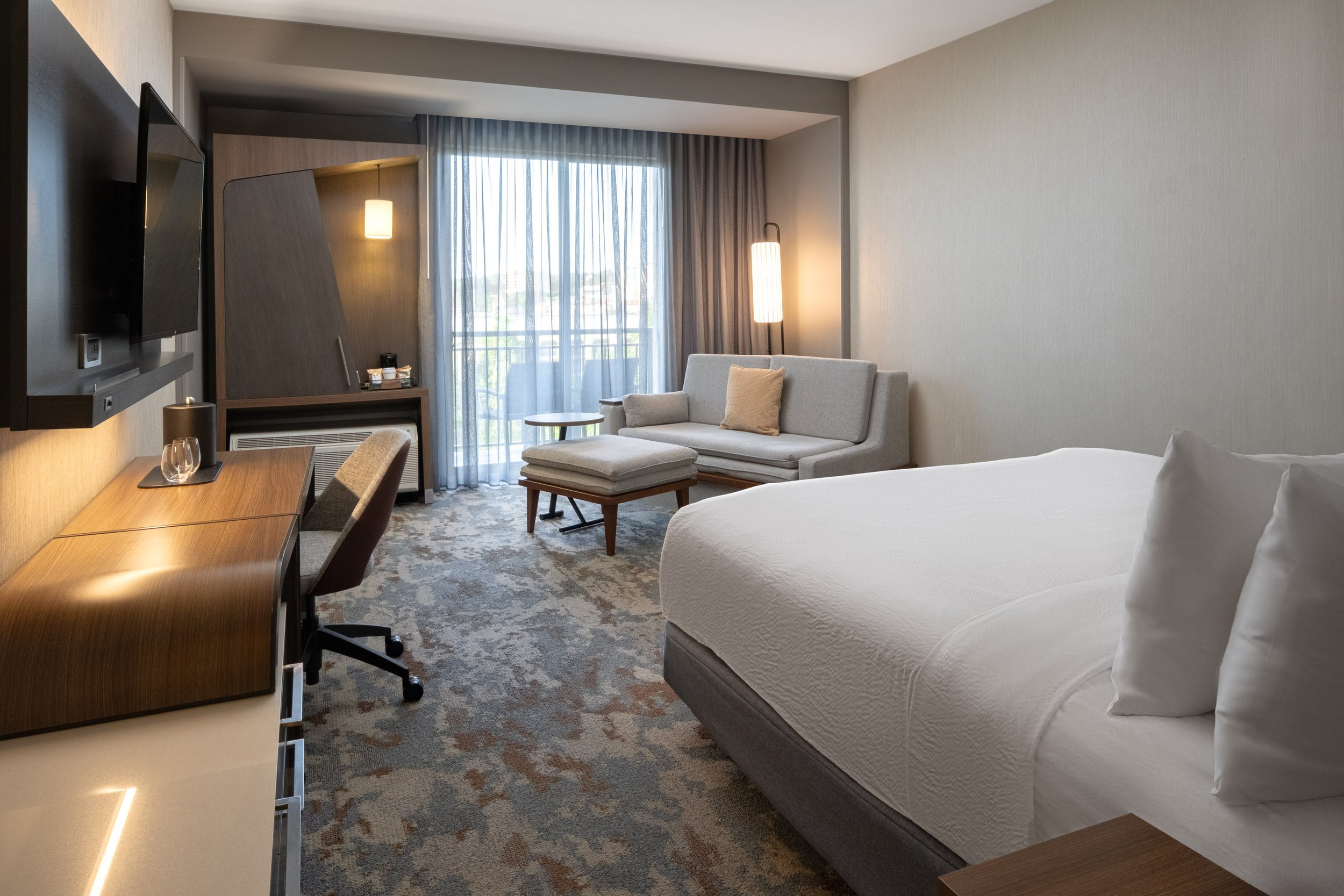  ORIGINAL FILENAME:  4923_TYSCP_Courtyard_omgl_window.jpg  FILE NAME:  Guest Room  PHOTO PLACEMENT TAG:  Search in DAC for: Guest Rooms  CAPTION:  Guest Room  MARKETING CAPTION:  This guest room angle shows the bed, sofa seating, work desk, televisio