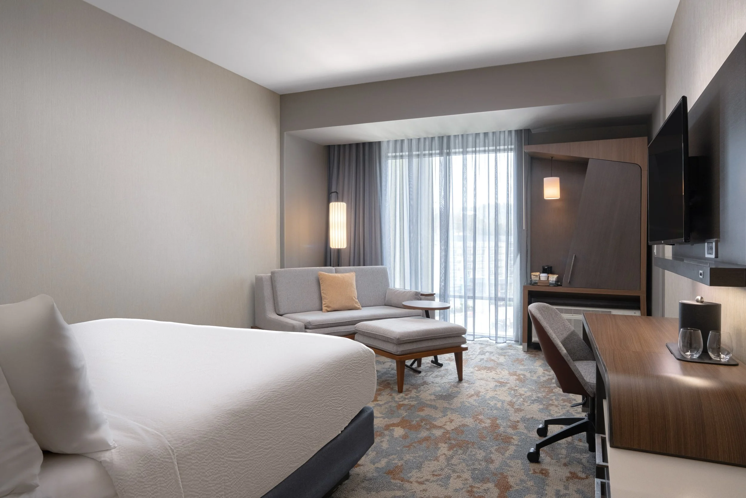 ORIGINAL FILENAME:  4925_TYSCP_Courtyard_ekng_window.jpg  FILE NAME:  Guest Room  PHOTO PLACEMENT TAG:  Search in DAC for: Guest Rooms  CAPTION:  King Guest Room  MARKETING CAPTION:  The King Guest Room window angle shows a bright layout with bed, s