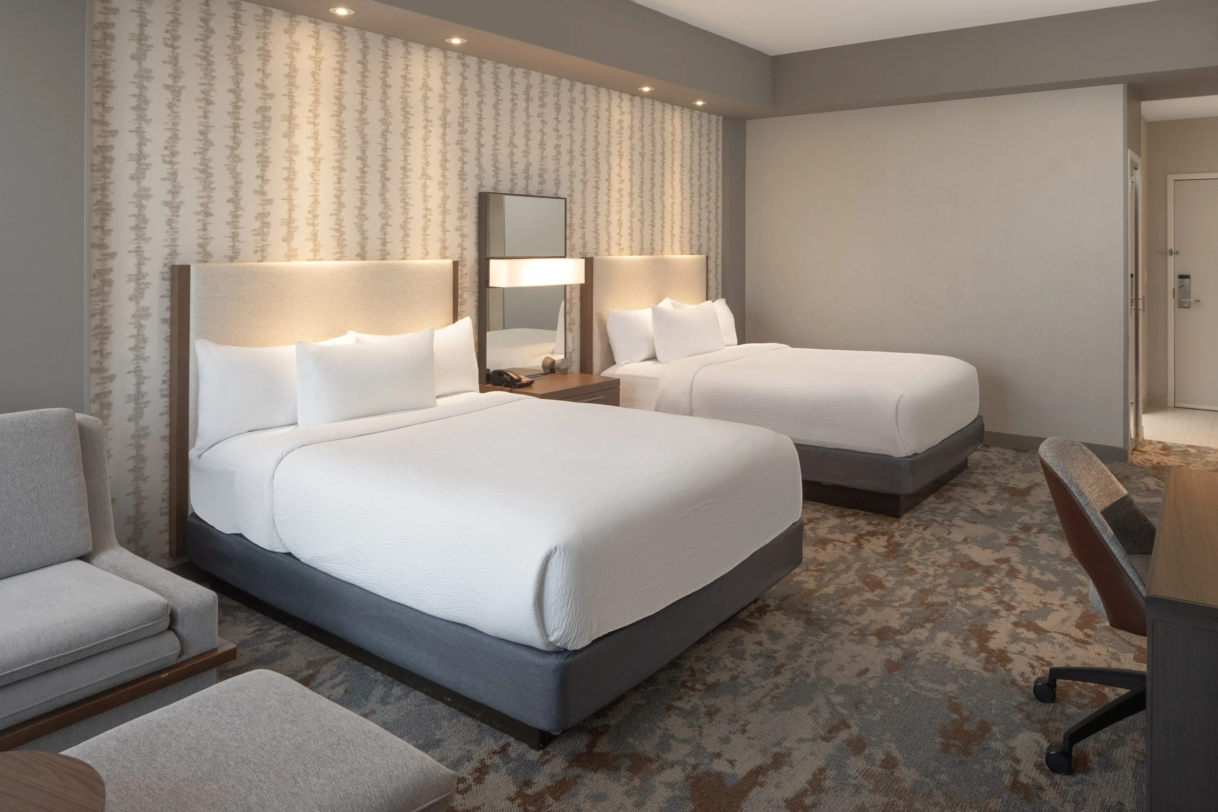  ORIGINAL FILENAME:  4928_TYSCP_Courtyard_watr_door.jpg  FILE NAME:  Guest Room  PHOTO PLACEMENT TAG:  Search in DAC for: Guest Rooms  CAPTION:  Queen/Queen Guest Room – Entry  MARKETING CAPTION:  The Queen/Queen Guest Room entry angle shows two beds