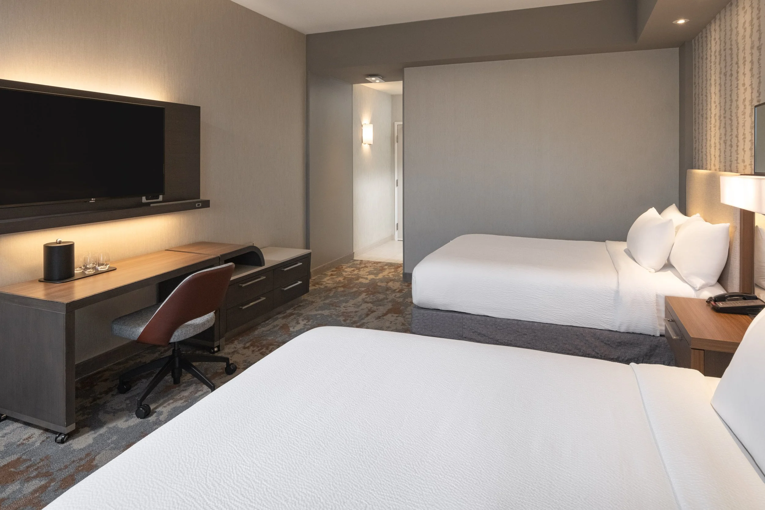  ORIGINAL FILENAME:  4930_TYSCP_Courtyard_qnqn_door.jpg  FILE NAME:  Guest Room  PHOTO PLACEMENT TAG:  Search in DAC for: Guest Rooms  CAPTION:  Queen/Queen Guest Room – Entry  MARKETING CAPTION:  The Queen/Queen Guest Room entry view shows the beds,