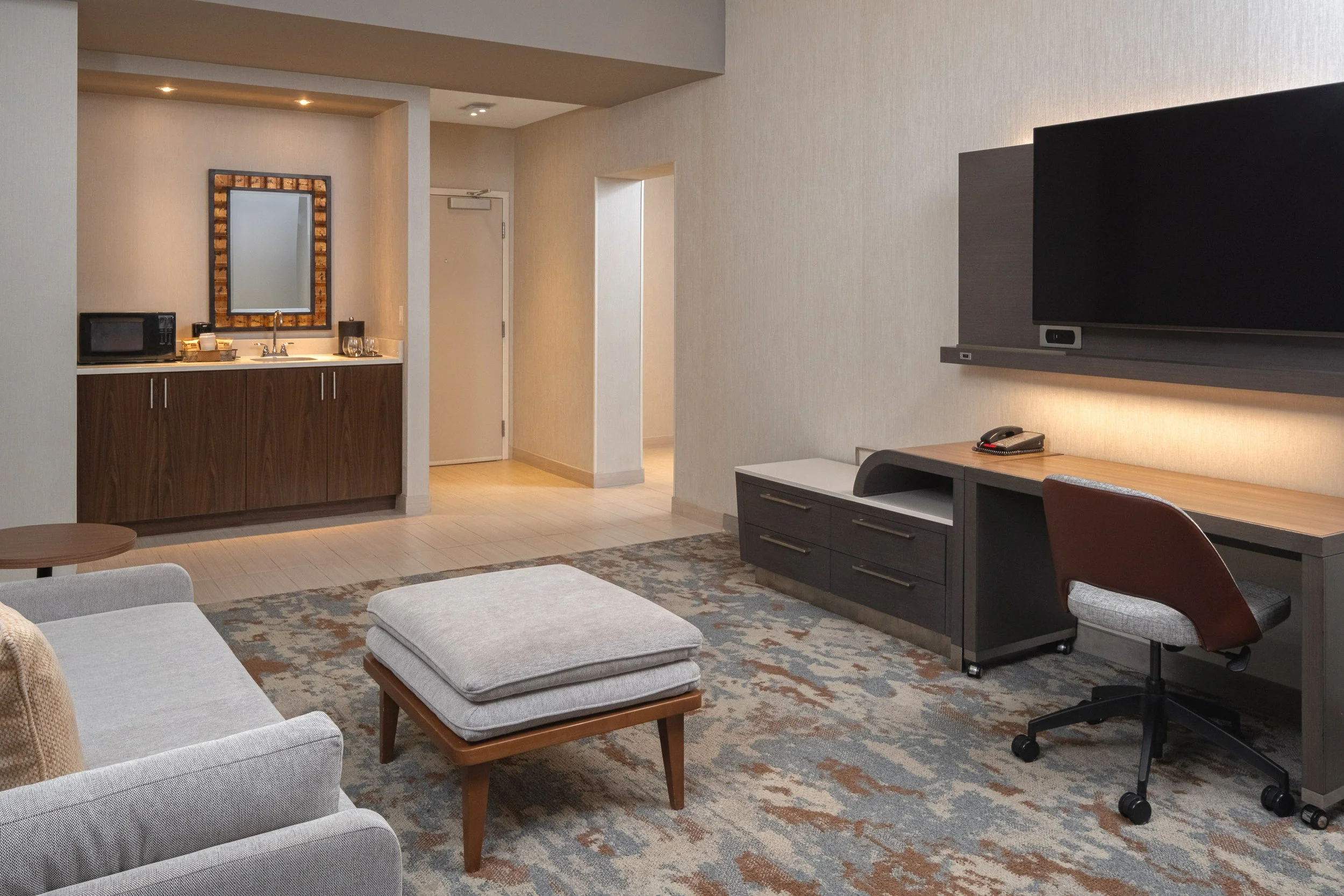  ORIGINAL FILENAME:  4936_TYSCP_Courtyard_qqst_livingdoor.jpg  FILE NAME:  Suite  PHOTO PLACEMENT TAG:  Search in DAC for: Suites  CAPTION:  Queen/Queen Suite Entry  MARKETING CAPTION:  The Queen/Queen Suite entry angle shows the living area, work de