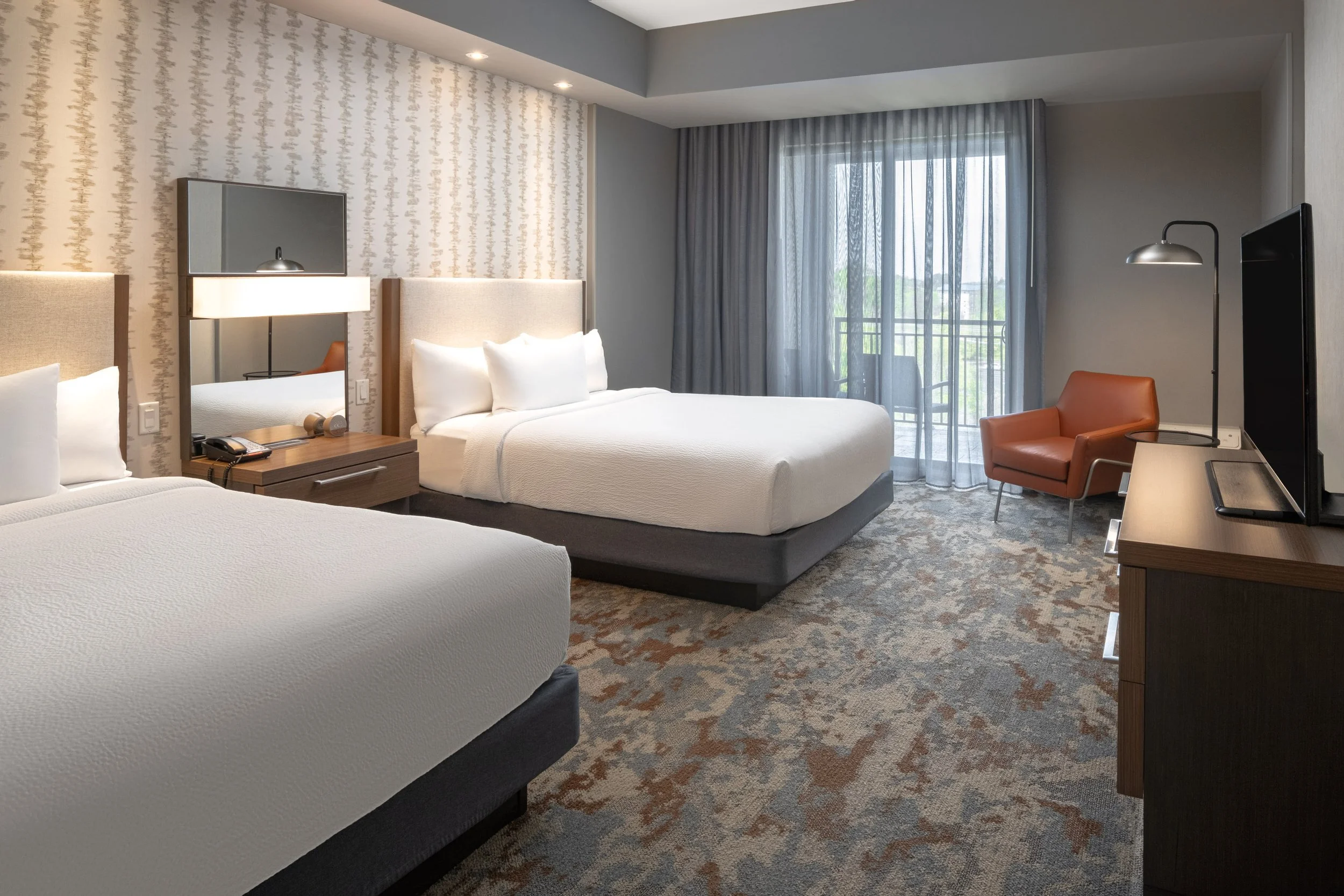  ORIGINAL FILENAME:  4937_TYSCP_Courtyard_qqst_bedroom.jpg  FILE NAME:  Suite  PHOTO PLACEMENT TAG:  Search in DAC for: Suites  CAPTION:  Queen/Queen Suite Bedroom  MARKETING CAPTION:  The Queen/Queen Suite bedroom includes two beds, a work desk, bal