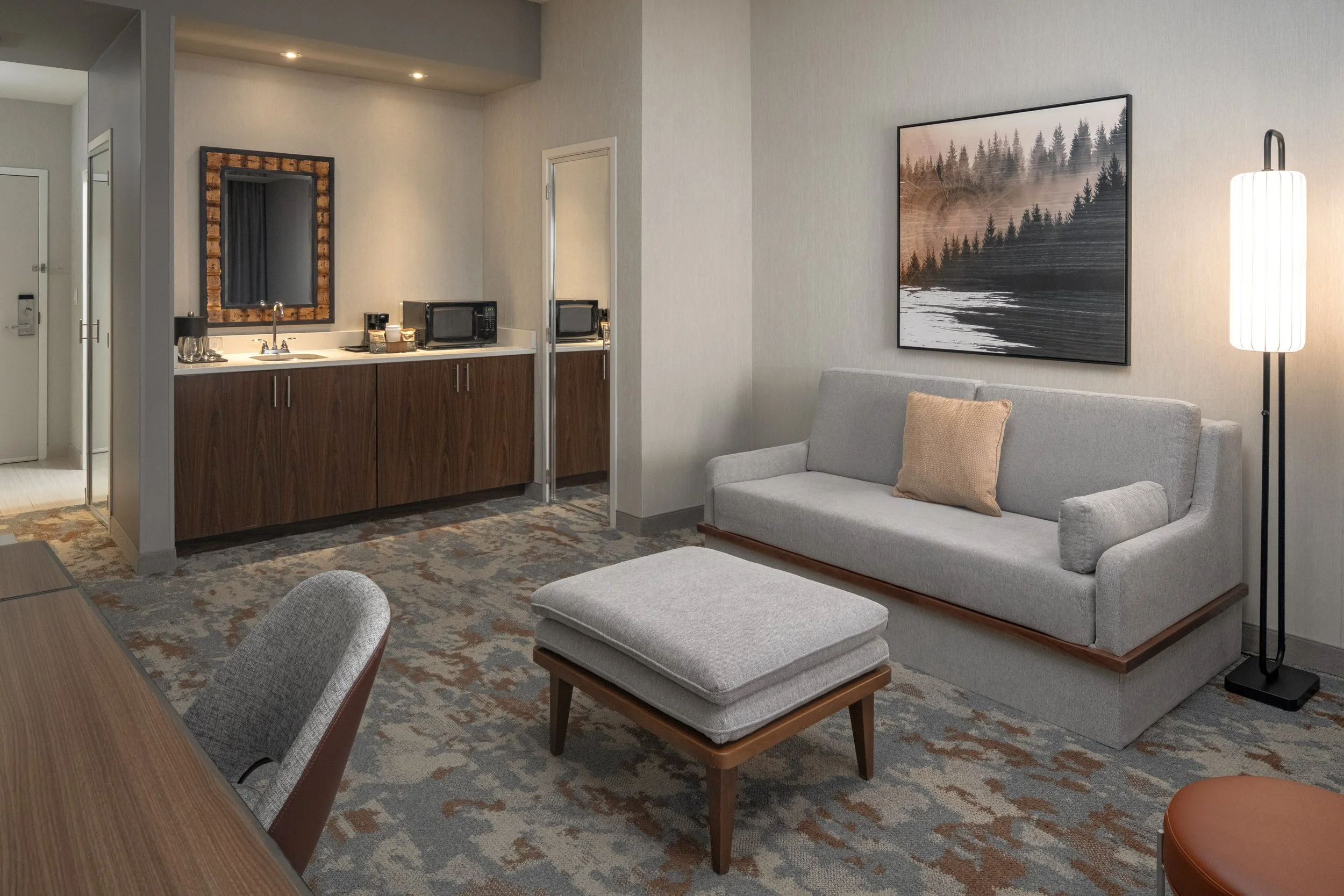  ORIGINAL FILENAME:  4939_TYSCP_Courtyard_kste_livingdoor.jpg  FILE NAME:  Suite  PHOTO PLACEMENT TAG:  Search in DAC for: Suites  CAPTION:  King Suite Living Area  MARKETING CAPTION:  The King Suite living area includes a sofa, ottoman, work desk, w