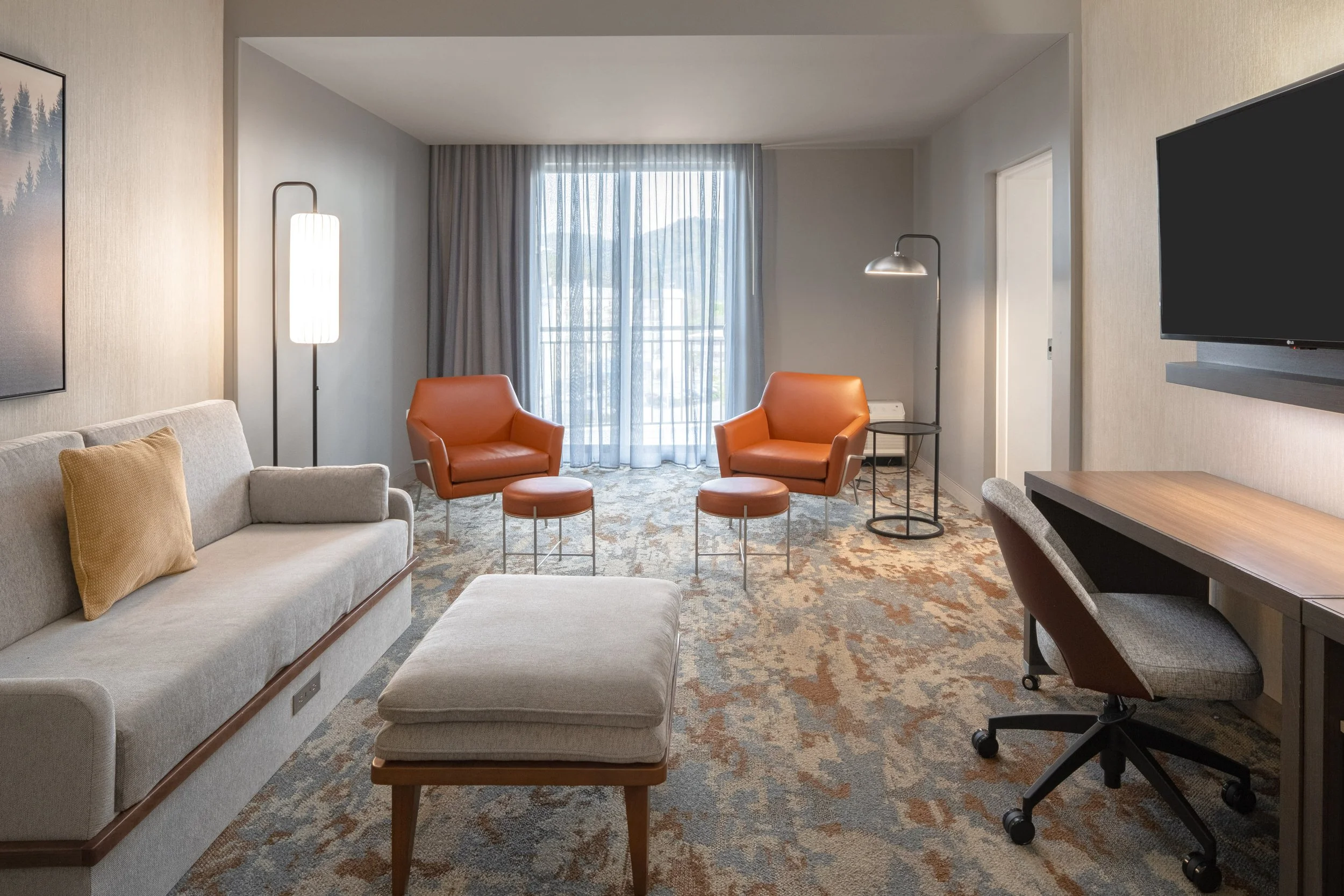  ORIGINAL FILENAME:  4940_TYSCP_Courtyard_kste_livingwindow.jpg  FILE NAME:  Suite  PHOTO PLACEMENT TAG:  Search in DAC for: Suites  CAPTION:  King Suite Seating Area  MARKETING CAPTION:  The King Suite window-side view highlights lounge seating, ott