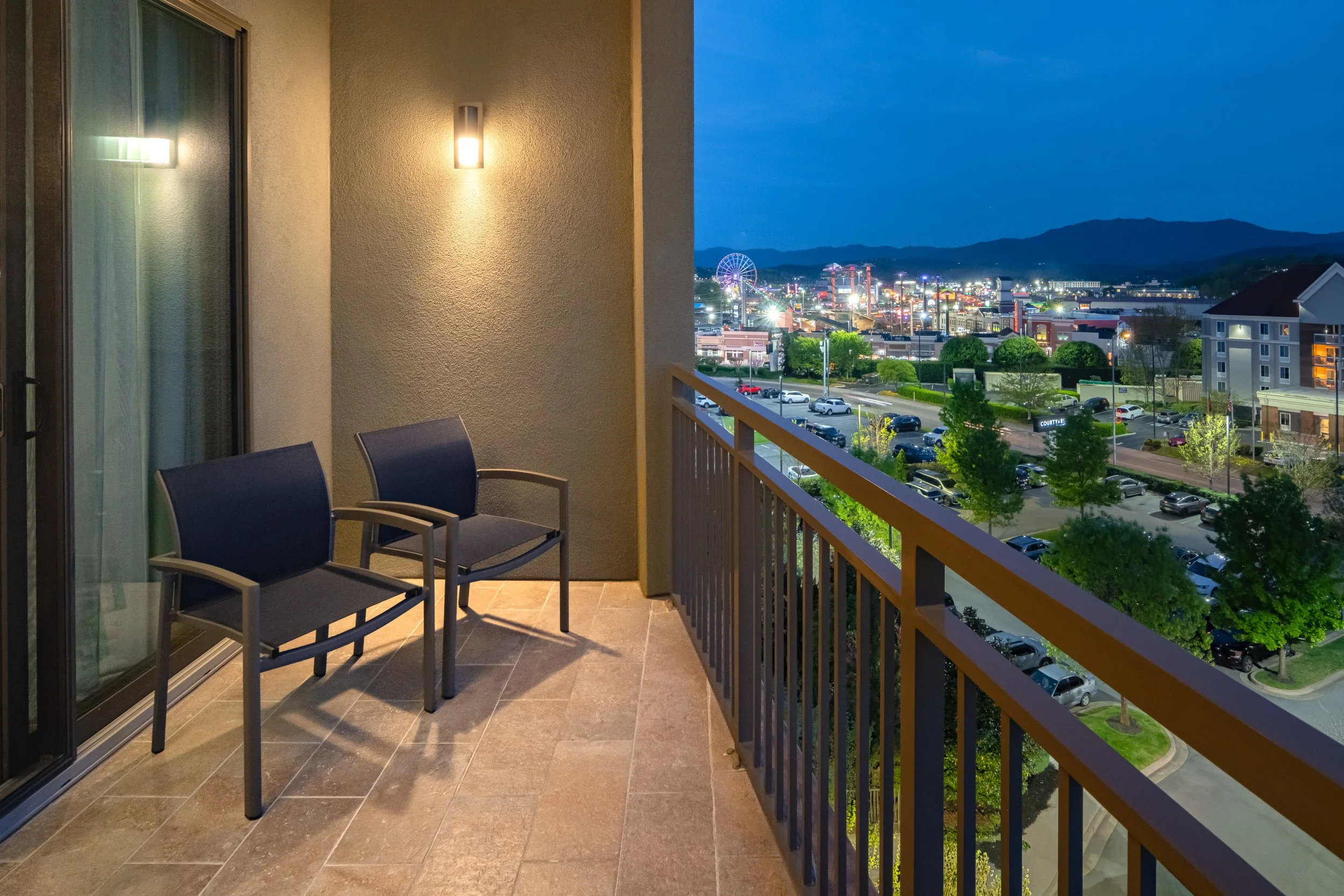  ORIGINAL FILENAME:  4943_TYSCP_Courtyard_room_balcony_a.jpg  FILE NAME:  Balcony  PHOTO PLACEMENT TAG:  Search in DAC for: Guest Rooms  CAPTION:  Guest Room Balcony  MARKETING CAPTION:  The guest room balcony includes outdoor chairs, railing, and an