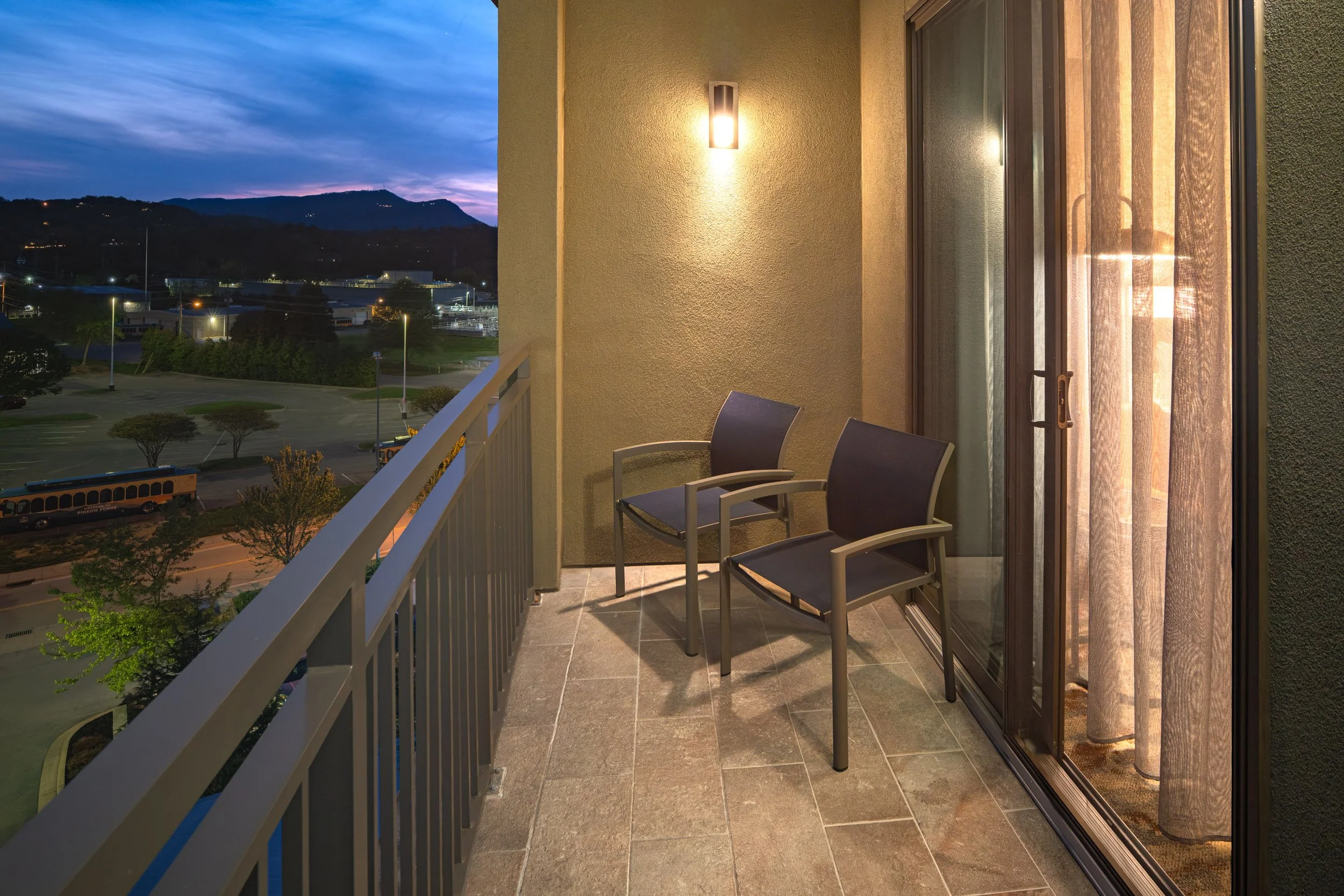  ORIGINAL FILENAME:  4944_TYSCP_Courtyard_room_balcony_b.jpg  FILE NAME:  Balcony  PHOTO PLACEMENT TAG:  Search in DAC for: Guest Rooms  CAPTION:  Guest Room Balcony  MARKETING CAPTION:  The second guest room balcony angle shows two outdoor chairs, s
