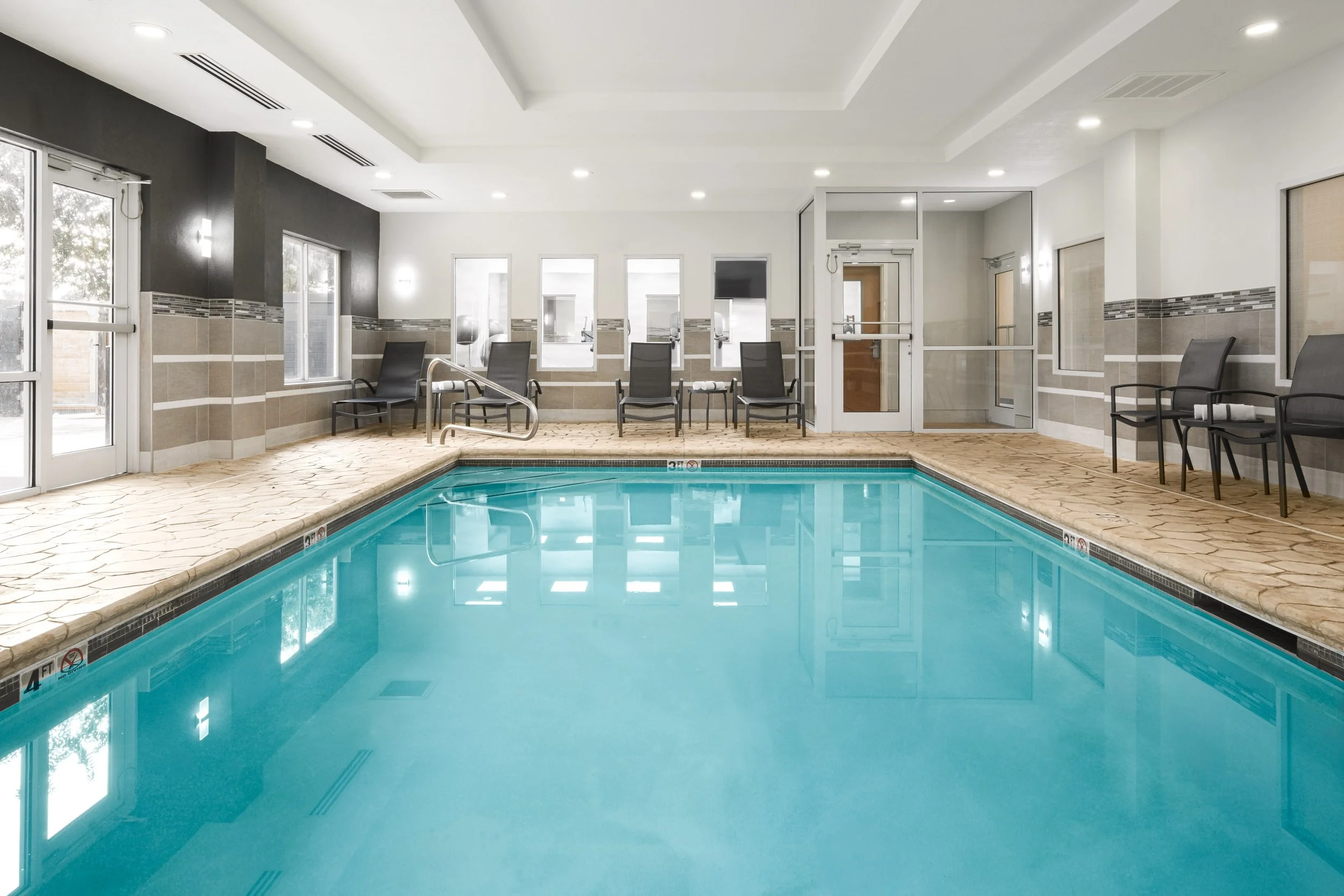  ORIGINAL FILENAME:  CHACL_14_Fairfield_indoorpool.jpg  FILE NAME:  Indoor Pool  PHOTO PLACEMENT TAG:  Search in DAC for: Recreation &amp; Fitness  CAPTION:  Indoor Pool  MARKETING CAPTION:  The indoor pool is surrounded by lounge chairs, safety rail