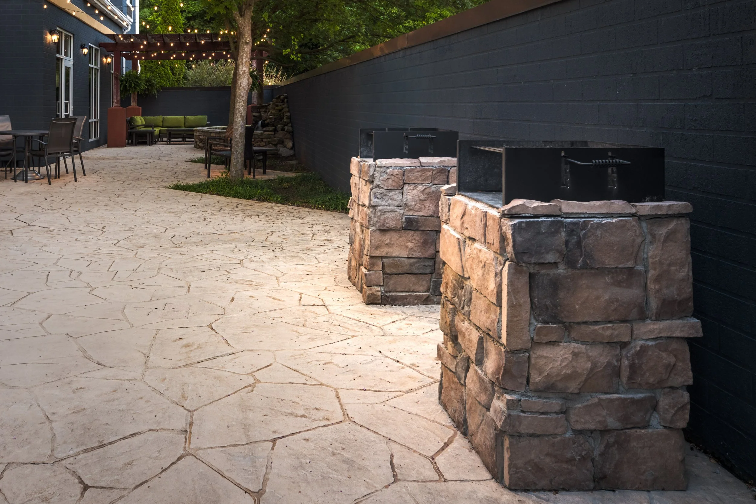  ORIGINAL FILENAME:  CHACL_16_Fairfield_charcoalgrills.jpg  FILE NAME:  Charcoal Grills  PHOTO PLACEMENT TAG:  Search in DAC for: Features  CAPTION:  Outdoor Patio – Charcoal Grills  MARKETING CAPTION:  Two stone charcoal grills sit along the patio, 