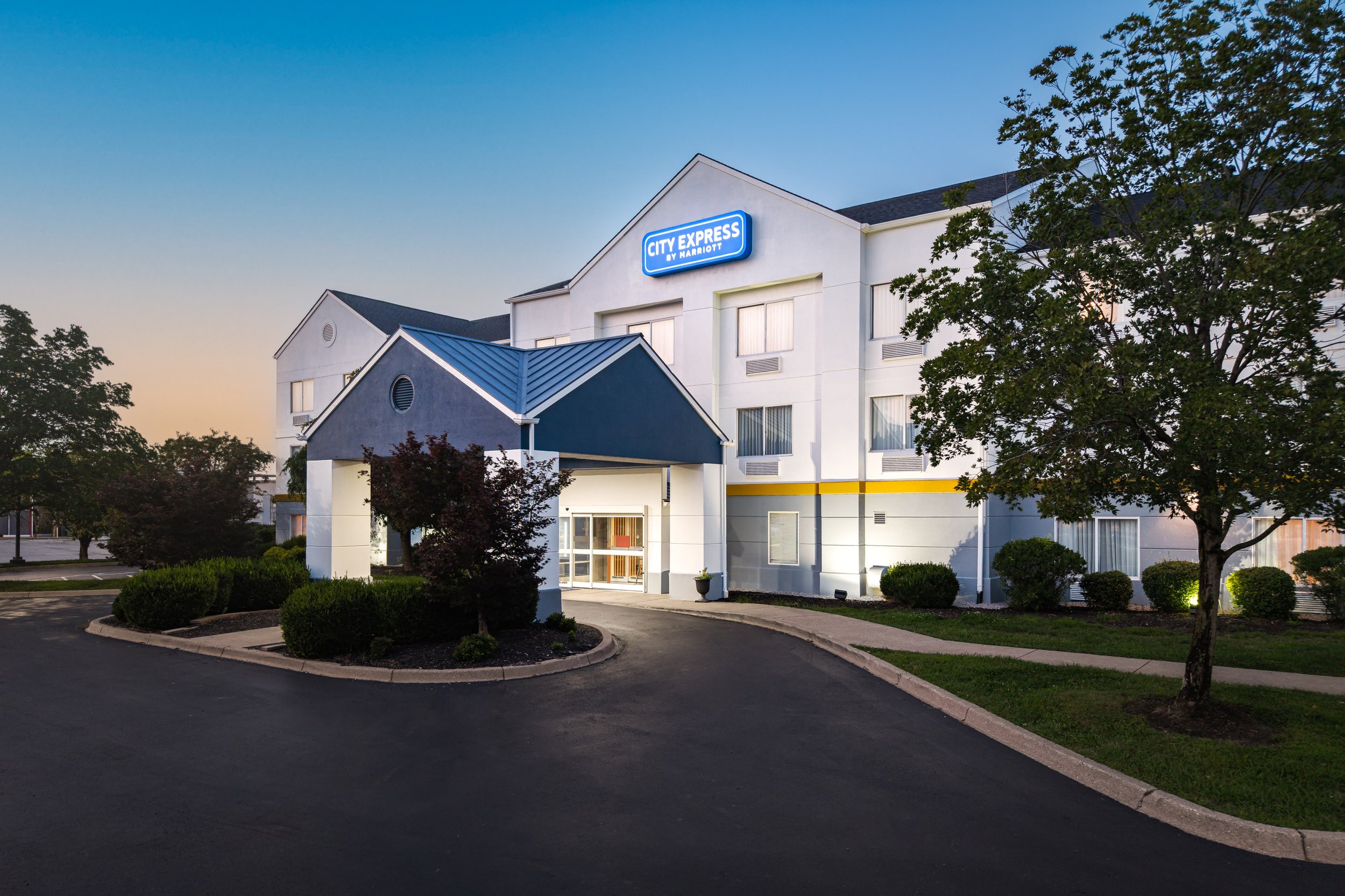  FILE NAME  Exterior  CAPTION  Exterior at Dusk  ALT TAG / LOGO DESCRIPTION  Exterior at dusk with entrance and facade  GUEST ROOM OR ADD-ON / NRP?  N / A  HAVE PRODUCT ID?  No  IS THIS AN ANCILLARY PRODUCT?  No  ADD TO HWS PHOTO GALLERY SECTION  Hot