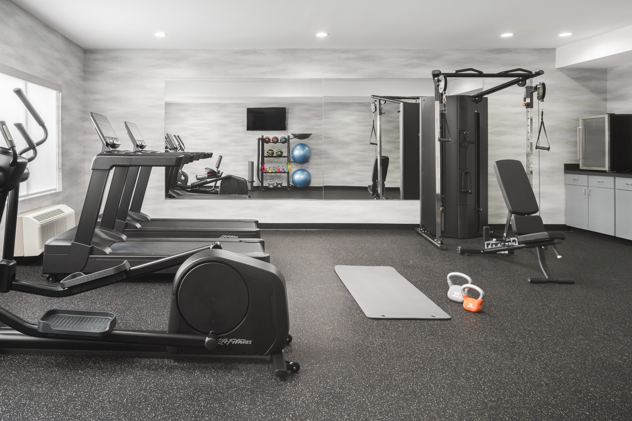  FILE NAME  Fitness Center  CAPTION  Fitness Center  ALT TAG / LOGO DESCRIPTION  Fitness center with cardio and weight equipment  GUEST ROOM OR ADD-ON / NRP?  N / A  HAVE PRODUCT ID?  No  IS THIS AN ANCILLARY PRODUCT?  No  ADD TO HWS PHOTO GALLERY SE