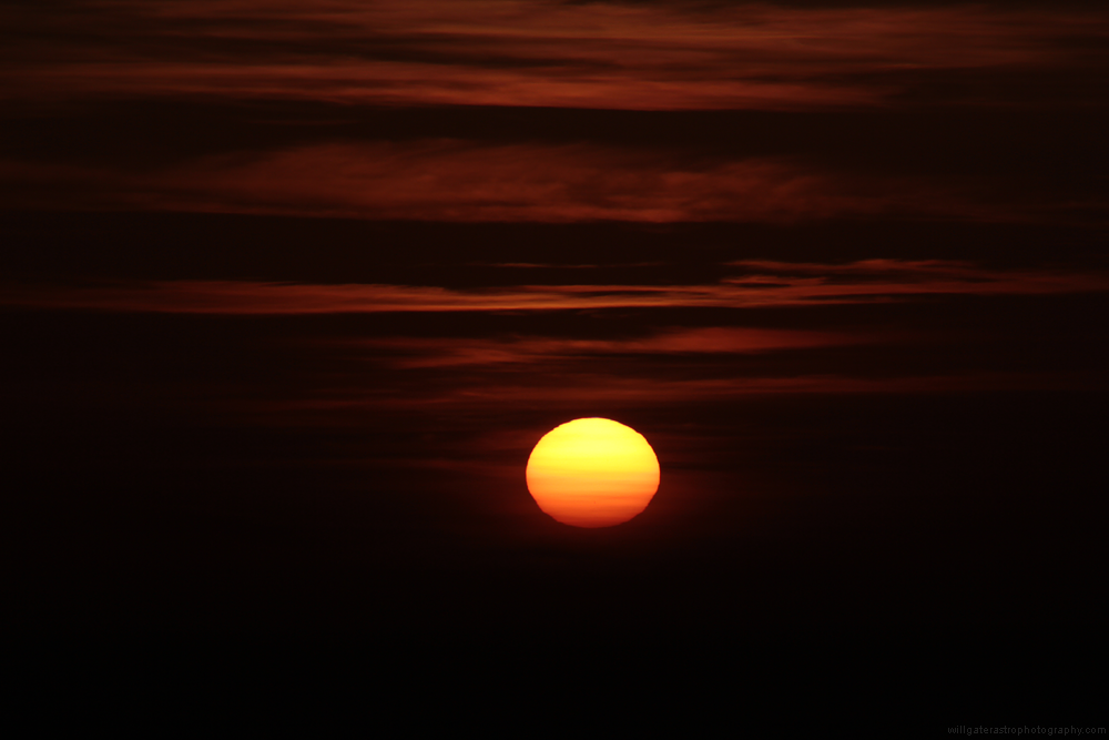 The Sun's distorted disc at sunset