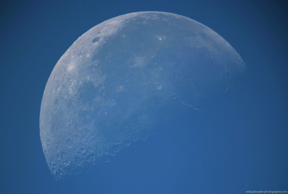 The Moon in the daytime sky showing surface features including Mare Humorum, Oceanus Procellarum and the craters Clavius, Copernicus, Aristarchus & Grimaldi