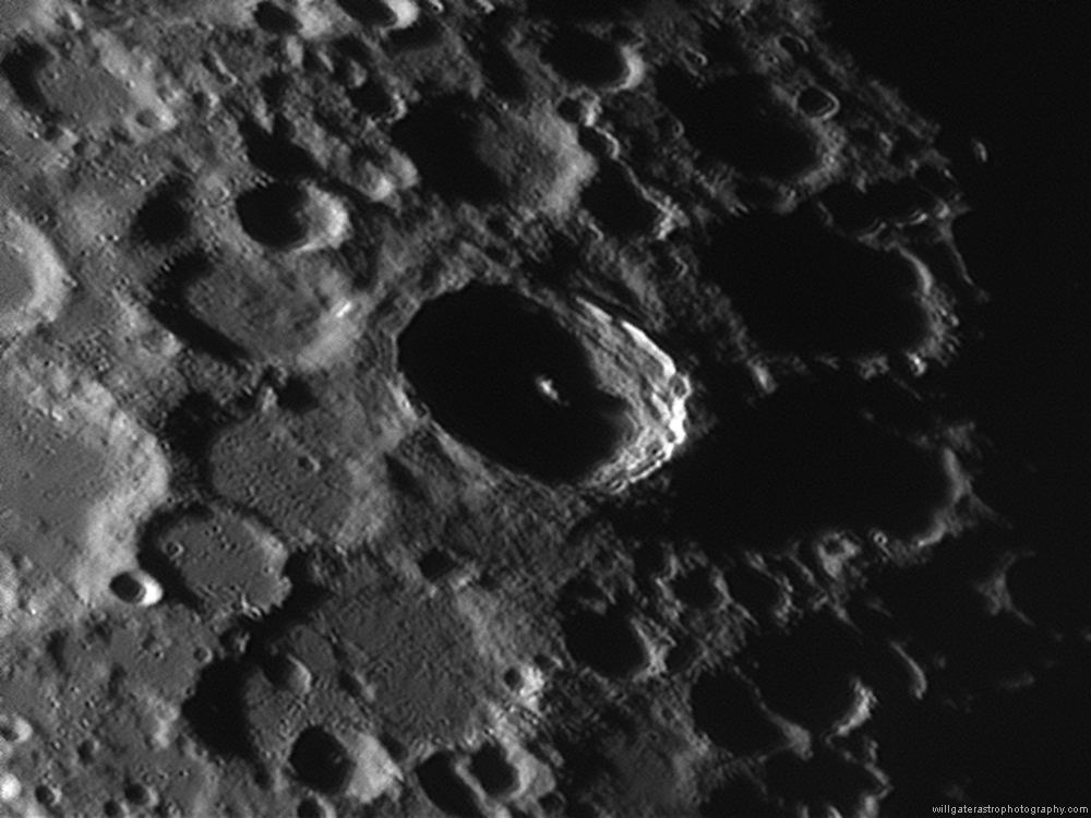 Lunar craters Street, Pictet and Tycho (centre) showing Tycho's central peak and terraced walls catching the sun