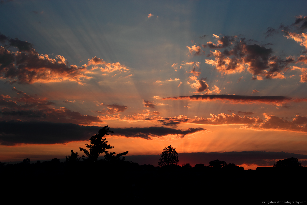 Long crepuscular rays at sunset