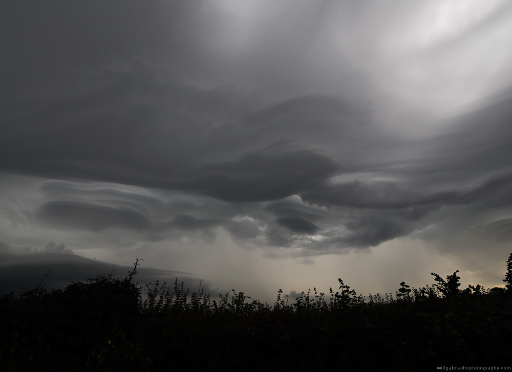 Dramatic (possible lenticulars below centre and at left) clouds ahead of advancing thunderstorm