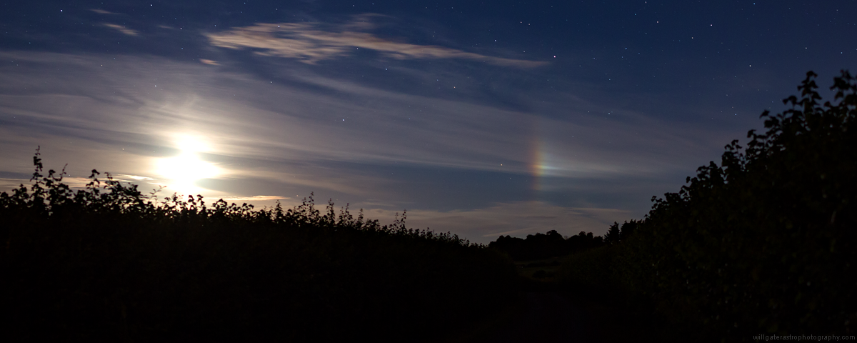 Bright moondog (paraselene) with the Moon and stars
