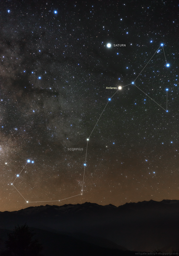 The constellation Scorpius with Saturn and the bright star Antares. Also shown is the Pipe Nebula at upper left.