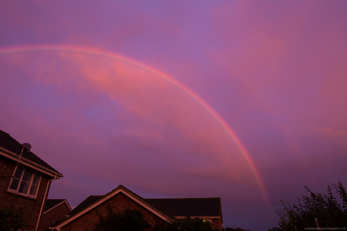 Reddened double rainbow at sunset - 7 August 2017