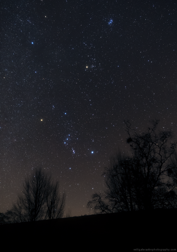 The constellations Orion and Taurus over Exmoor National Park including the bright stars Betelgeuse, Rigel and Aldebaran as well as the Hyades & Pleiades star clusters