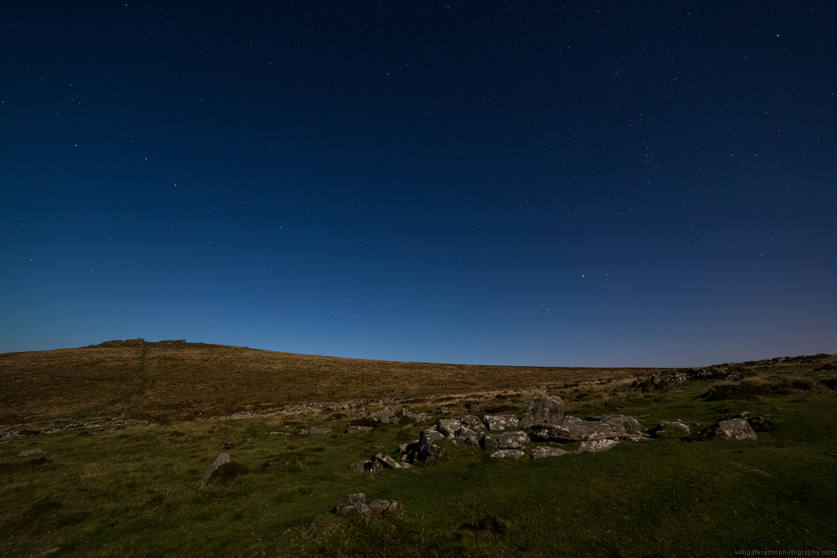 Hookney Tor and the Bronze Age hut circles at Grimspound, Dartmoor, bathed in moonlight