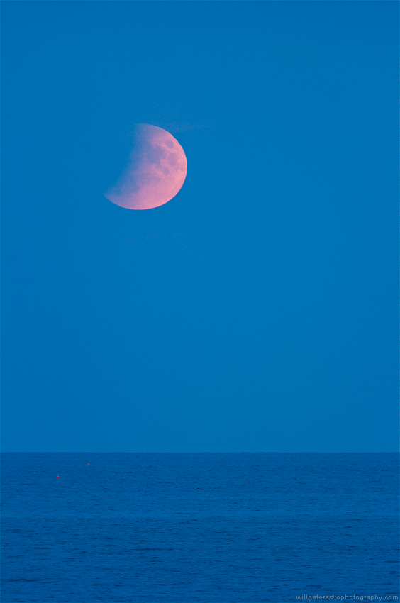 The rising (partially eclipsed) full Moon, Charmouth Beach - 16 July 2019
