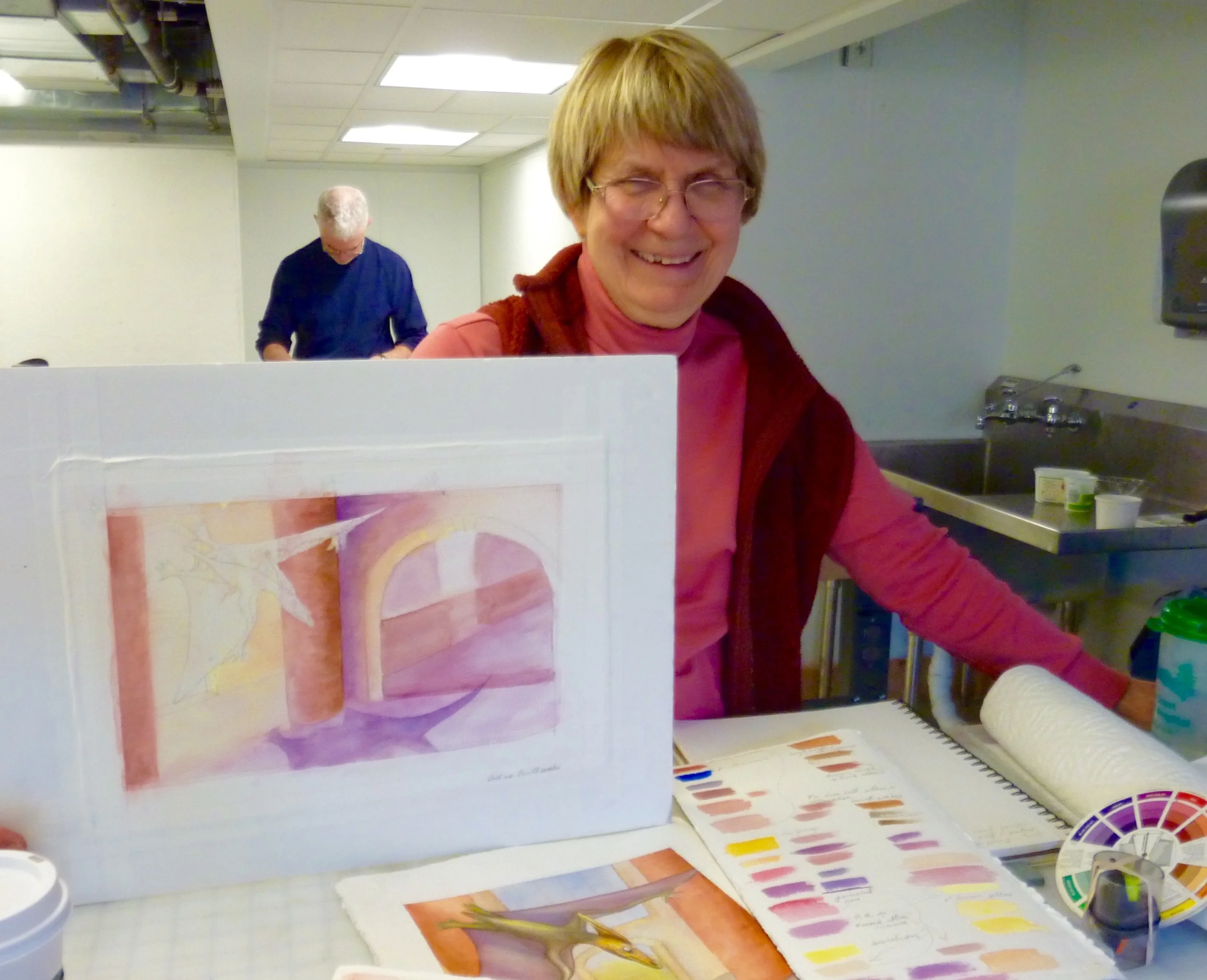 Dede worked on mixing colors and dropping them to achieve a "glow" in her background.