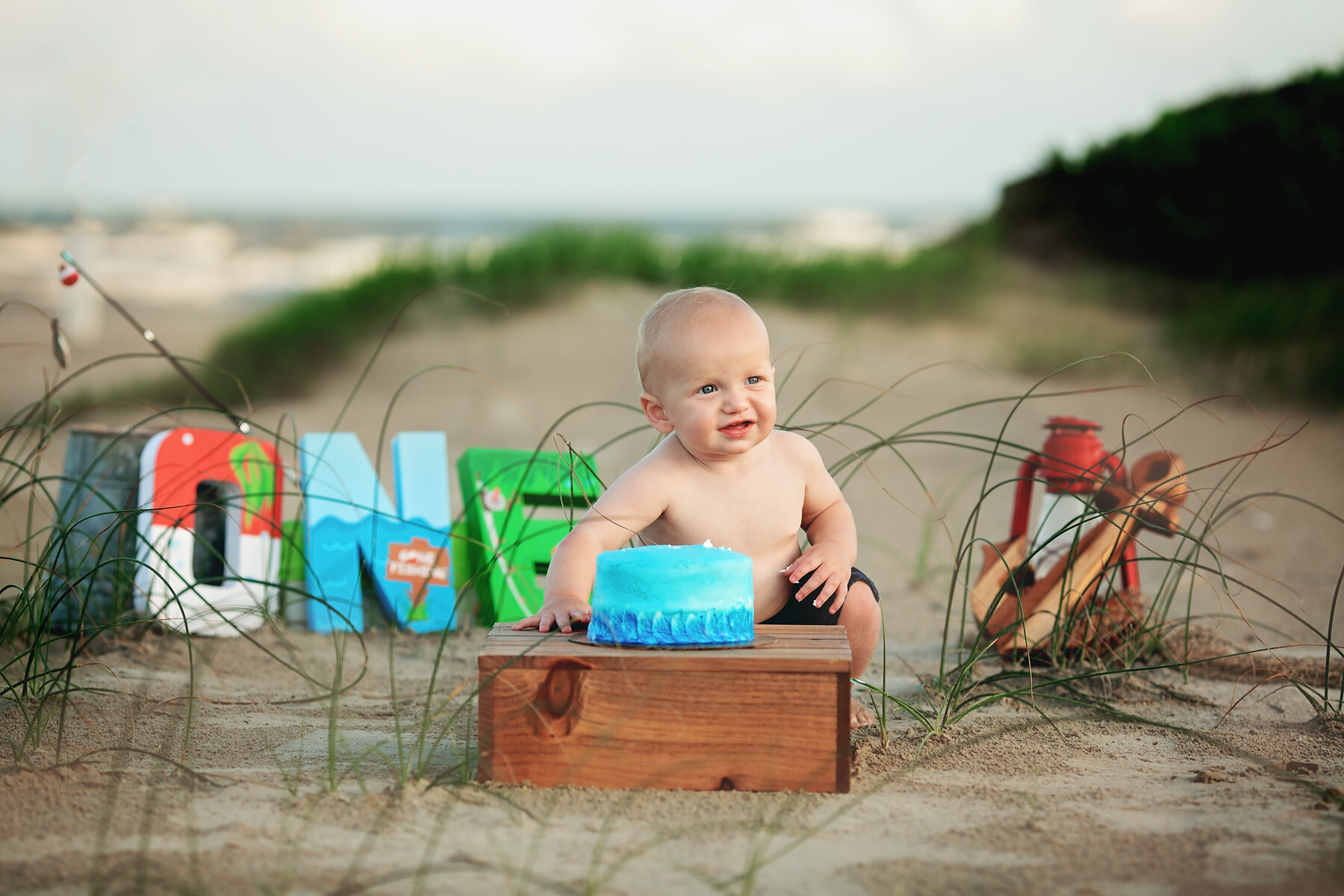 Fishing themed cake smash for this little beach baby!