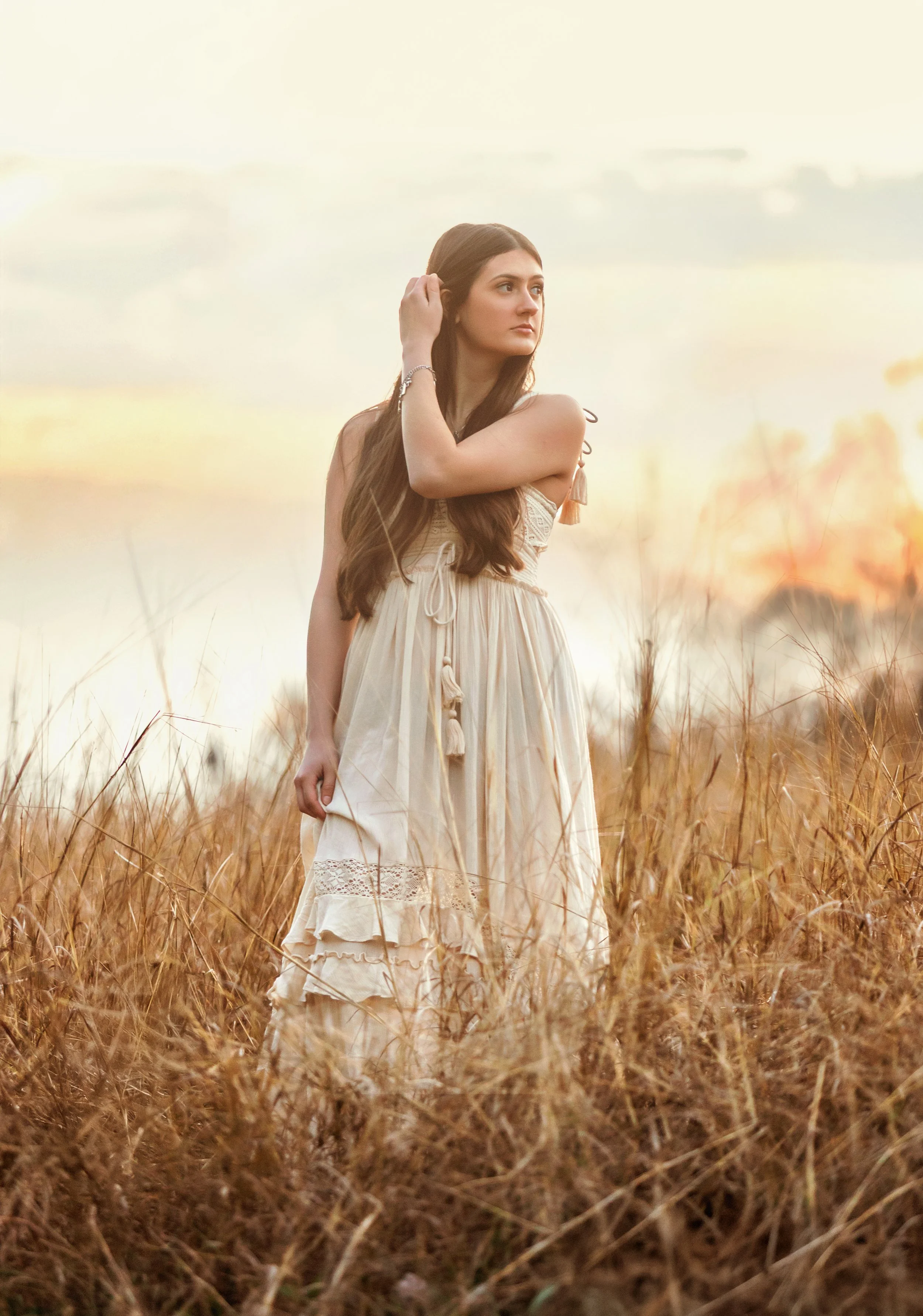 Senior girl friendswood, tx field at sunset