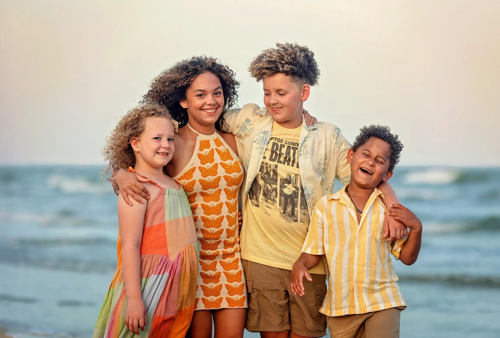 4 siblings on galveston beach photoshoot