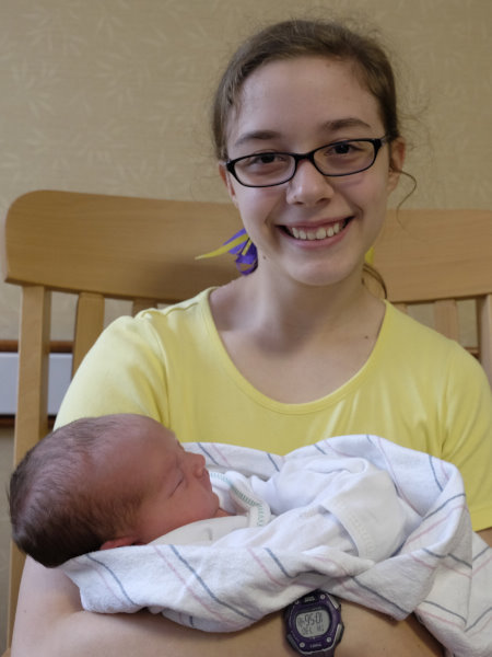 Julia loves having another sibling