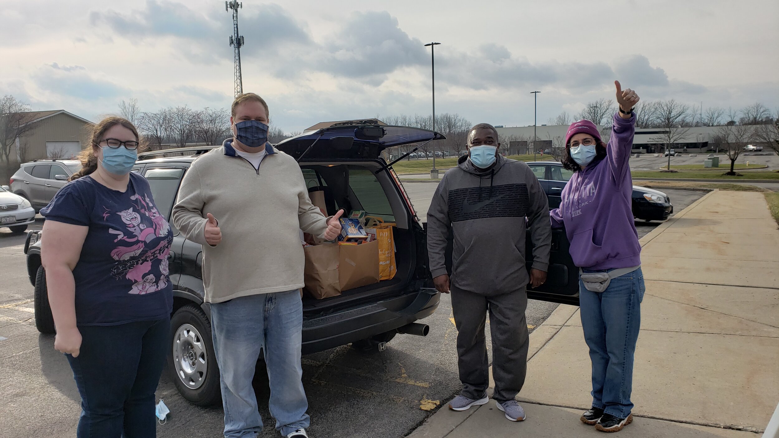 food loaded in car thumbs up.jpg