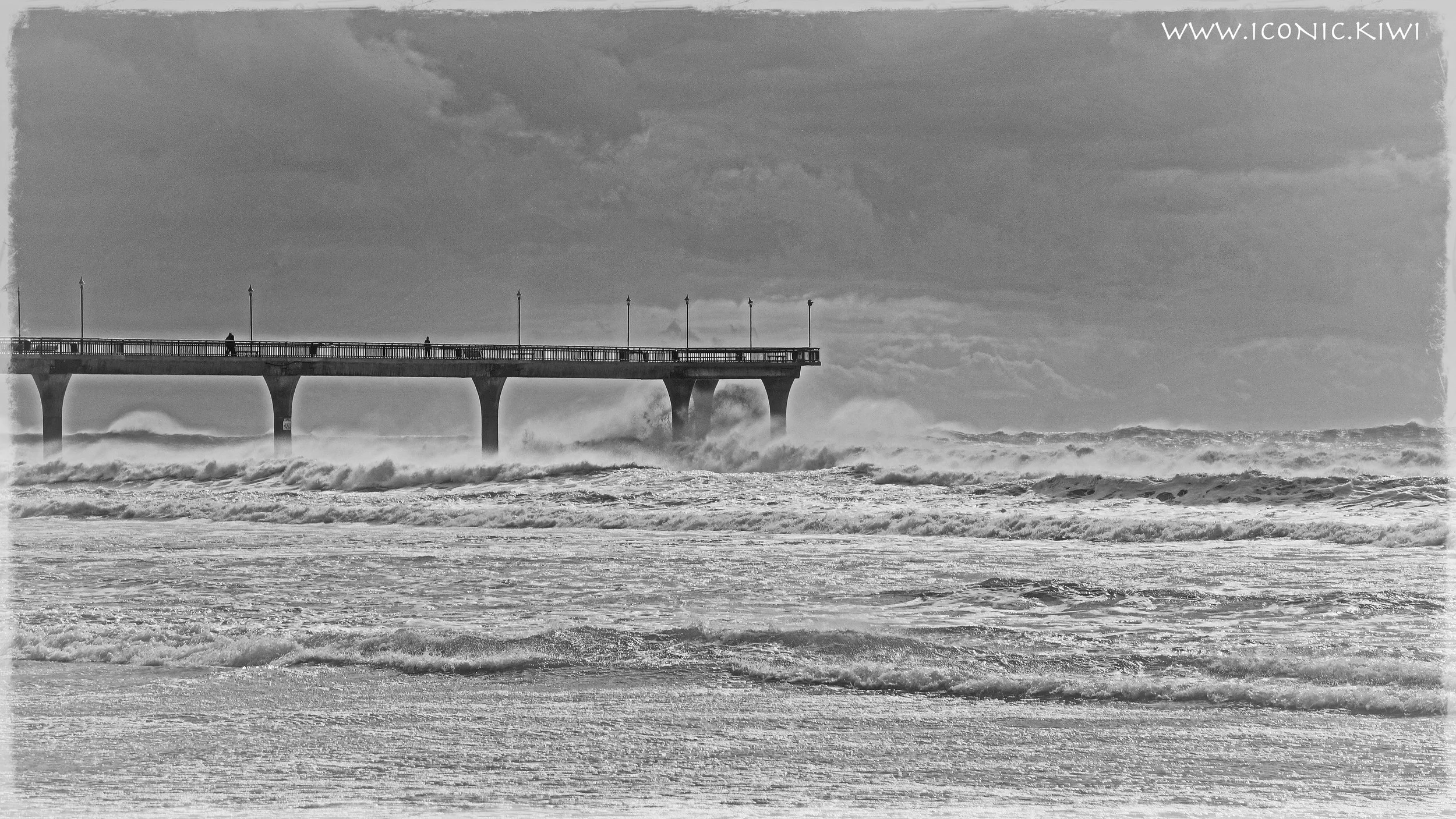 Christchurch Pier, where stormy waves mingle with the clouds