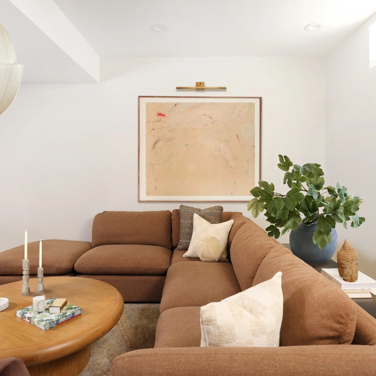 I love snowy days &mdash; especially if I get to cocoon here.

This cinematic lounge is all about sinking into those deep seats, warm woods, soft curves, and lighting that makes winter feel gentle instead of harsh. It&rsquo;s the kind of room that ma