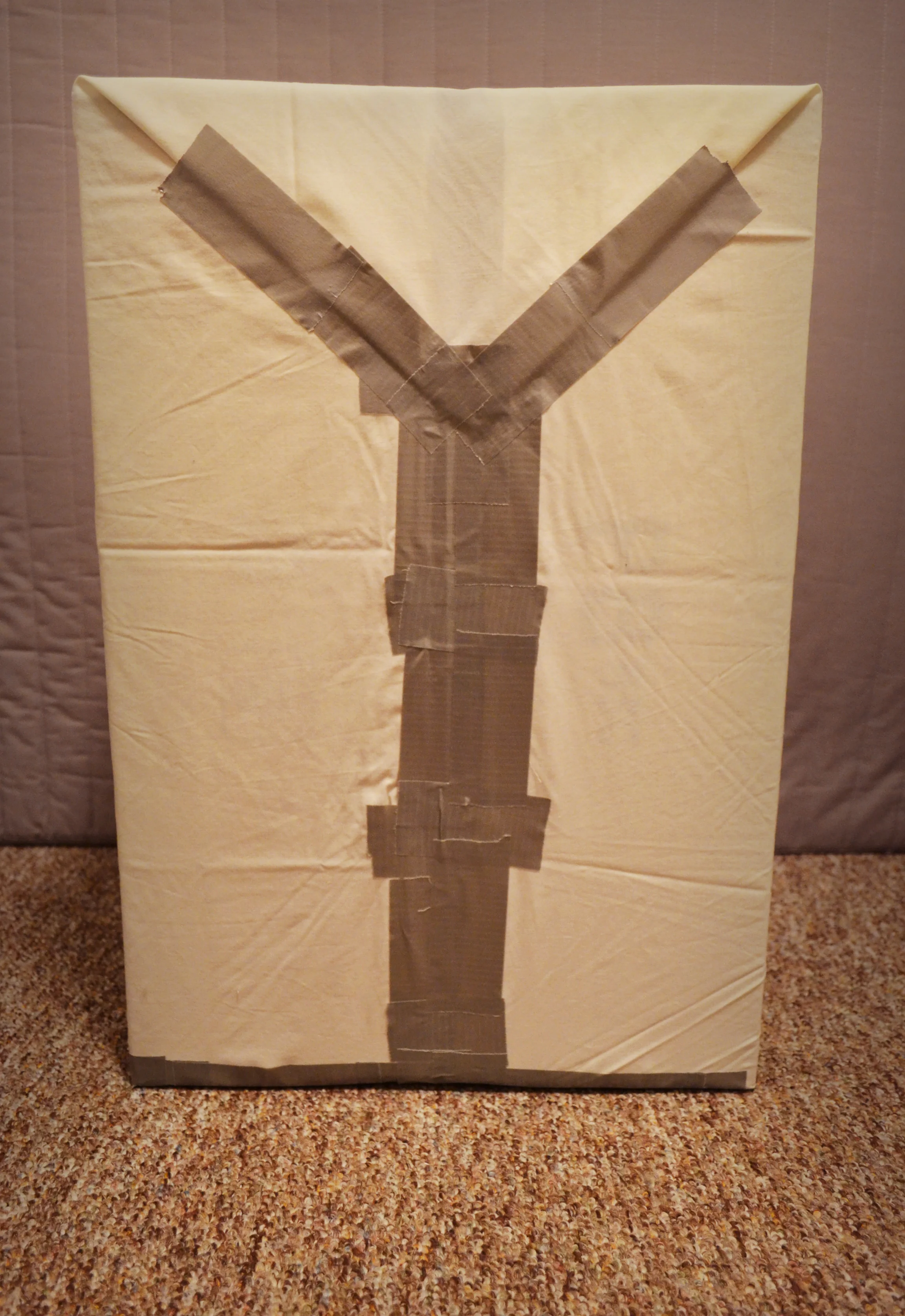 taping the cloth tight