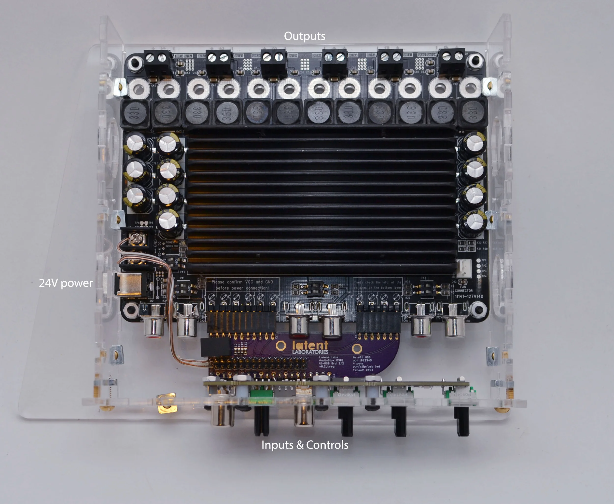 inputs & controls are below and outputs are above. the DC power jack is to the left.