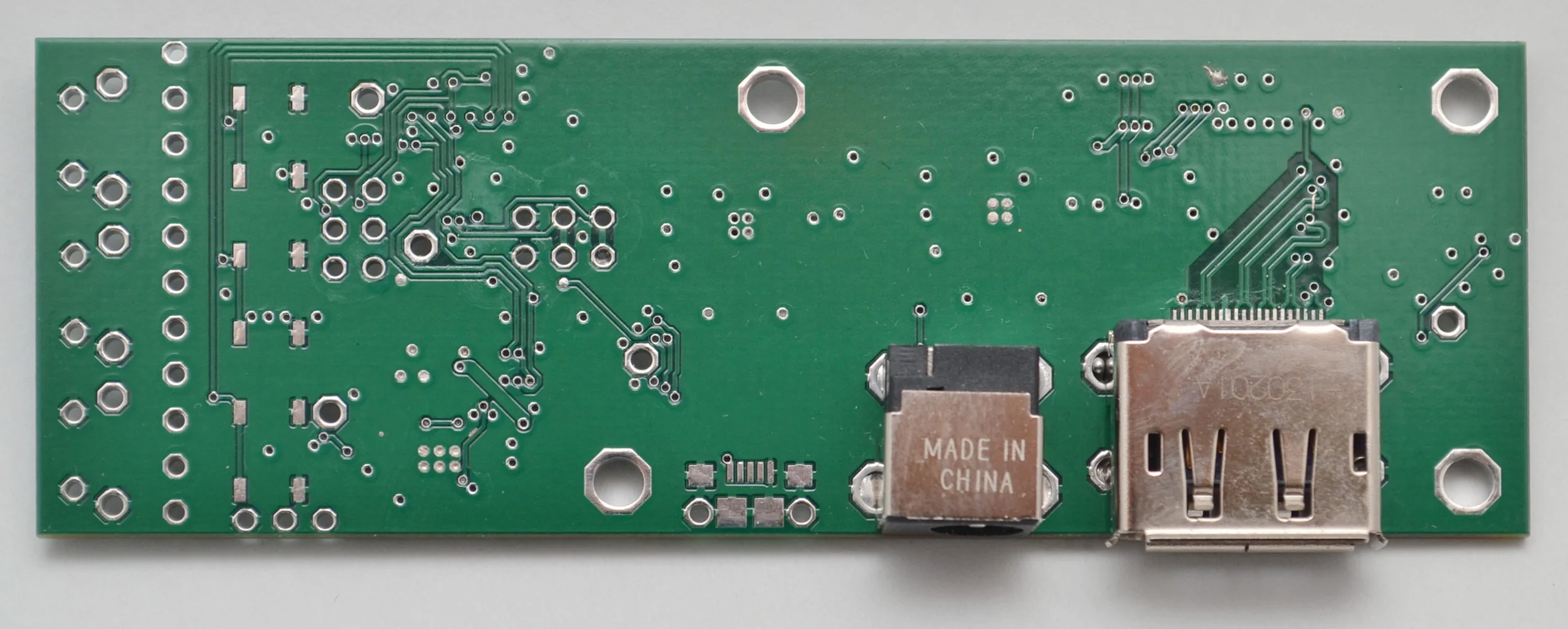 Retina iPad interface board, partially-assembled, bottom view.