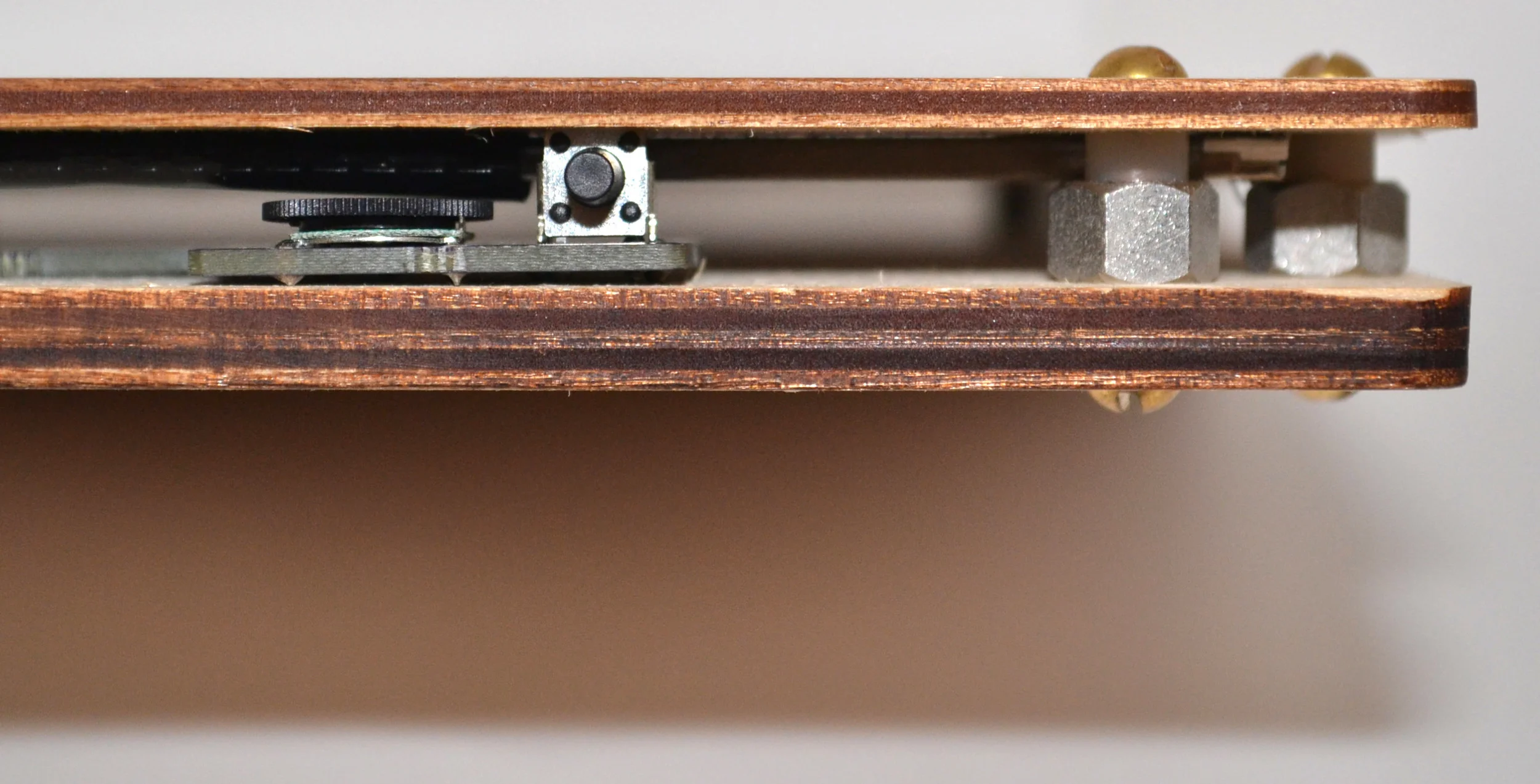 on/off button and brightness dial, coplanar view