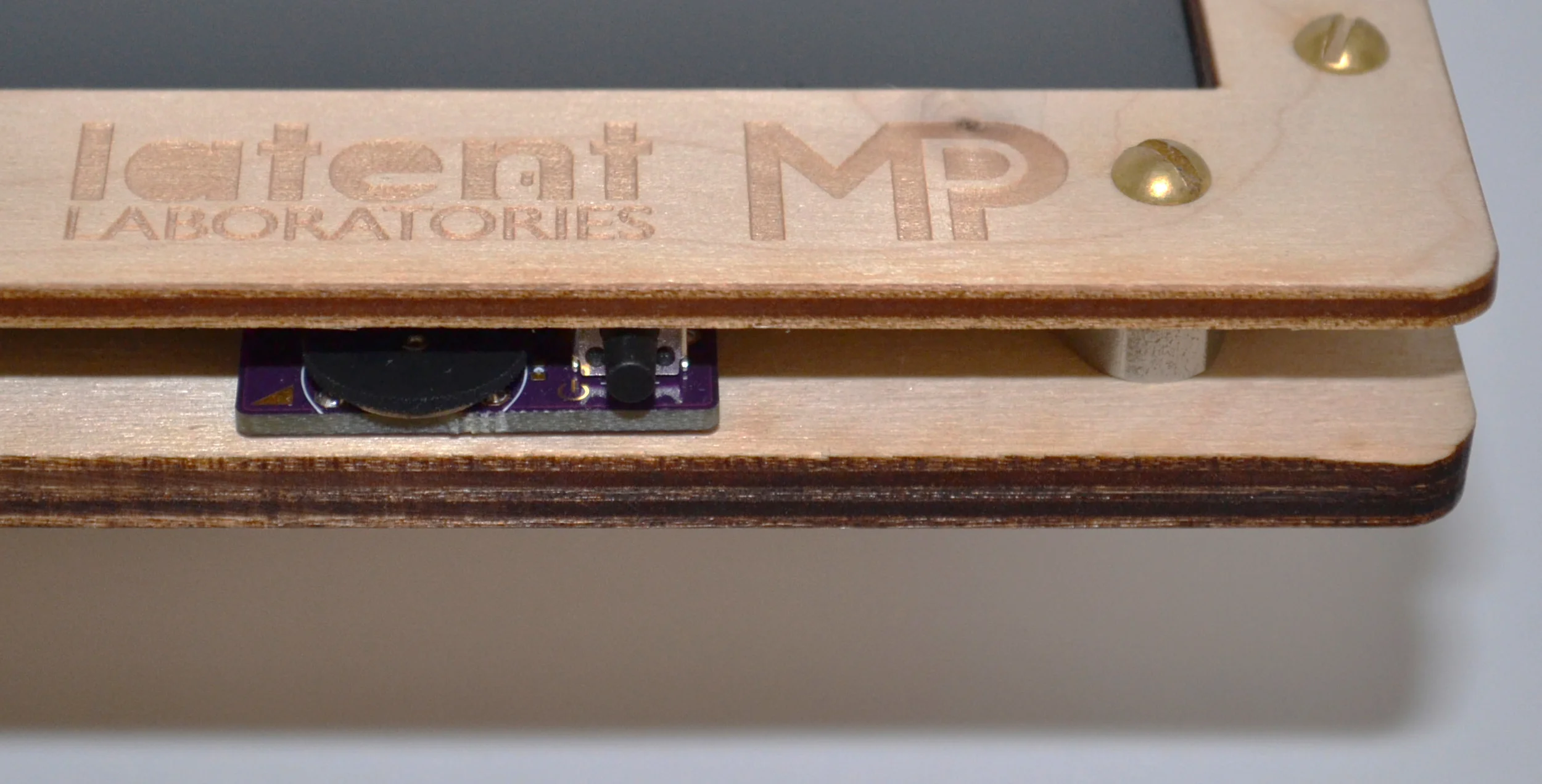 on/off button and brightness dial, angled view