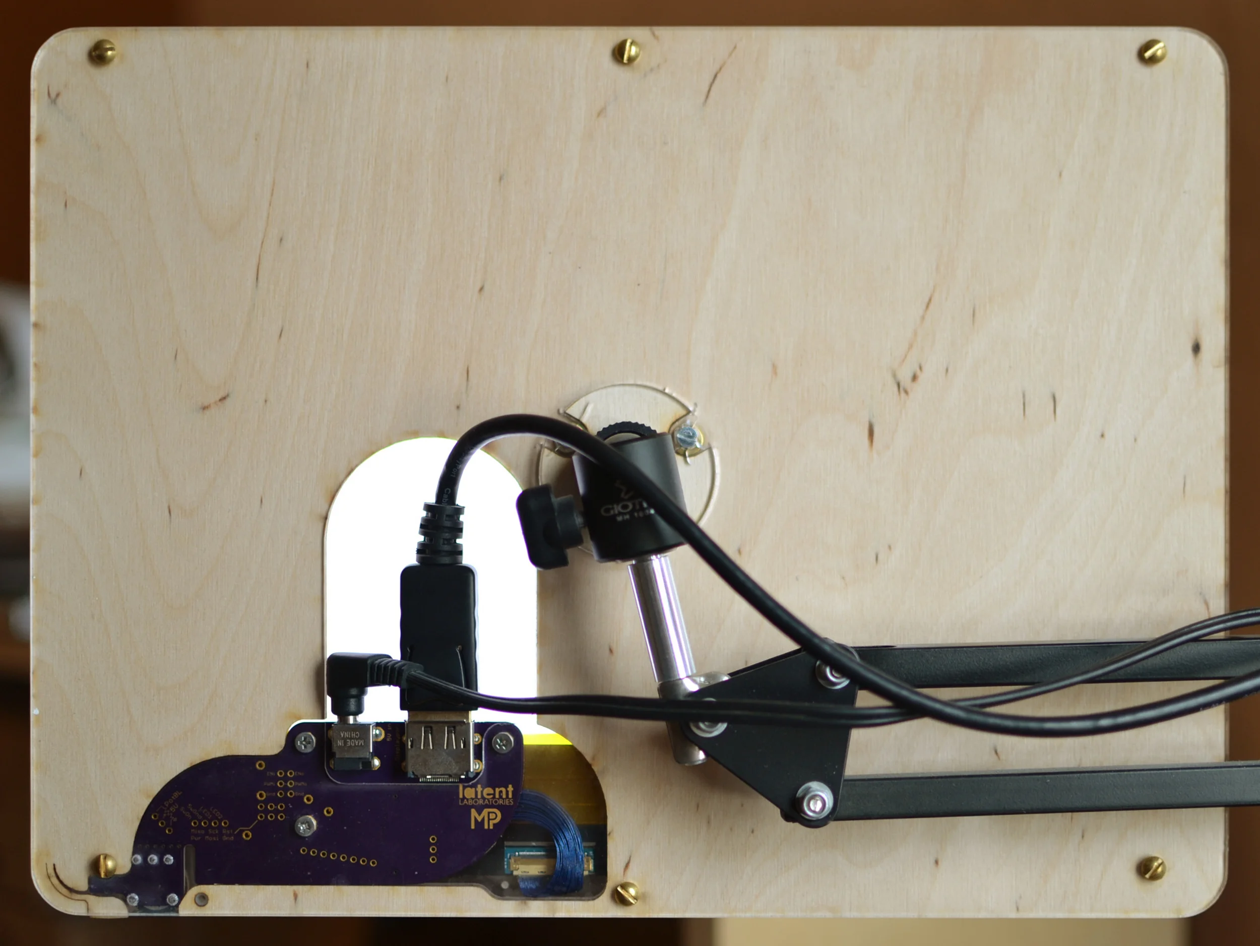 designed-to-be-lasercut chassis, version 2, rear view. LCD backlight illuminates the ports, helping you find them in the dark.