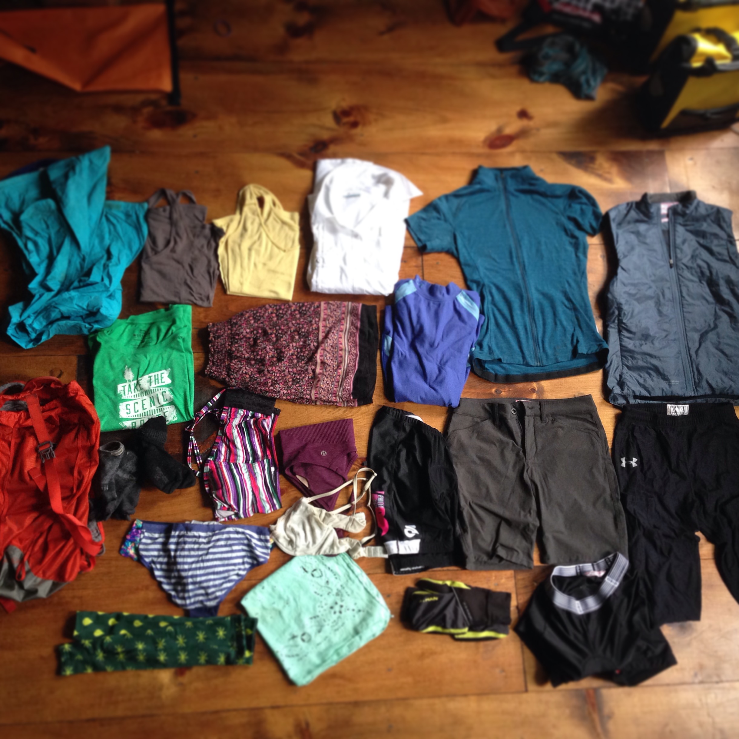 Clothing layout: raincoat, 2 x tank tops, #columbia SPF 40 long sleeve,@girocycling #wool jersey and vest, tshirt, camp skirt, warm top base layer, 2 x socks (#injin toe socks / giro wool), bikini top, 2 x bra, cycling shorts (#ppt thin chamoux / giro#undershort), giro overshort, warm base leggings, BANDANA, 3 x undies, warm gloves, @rohancycling arm warmers, roll up@rei backpack