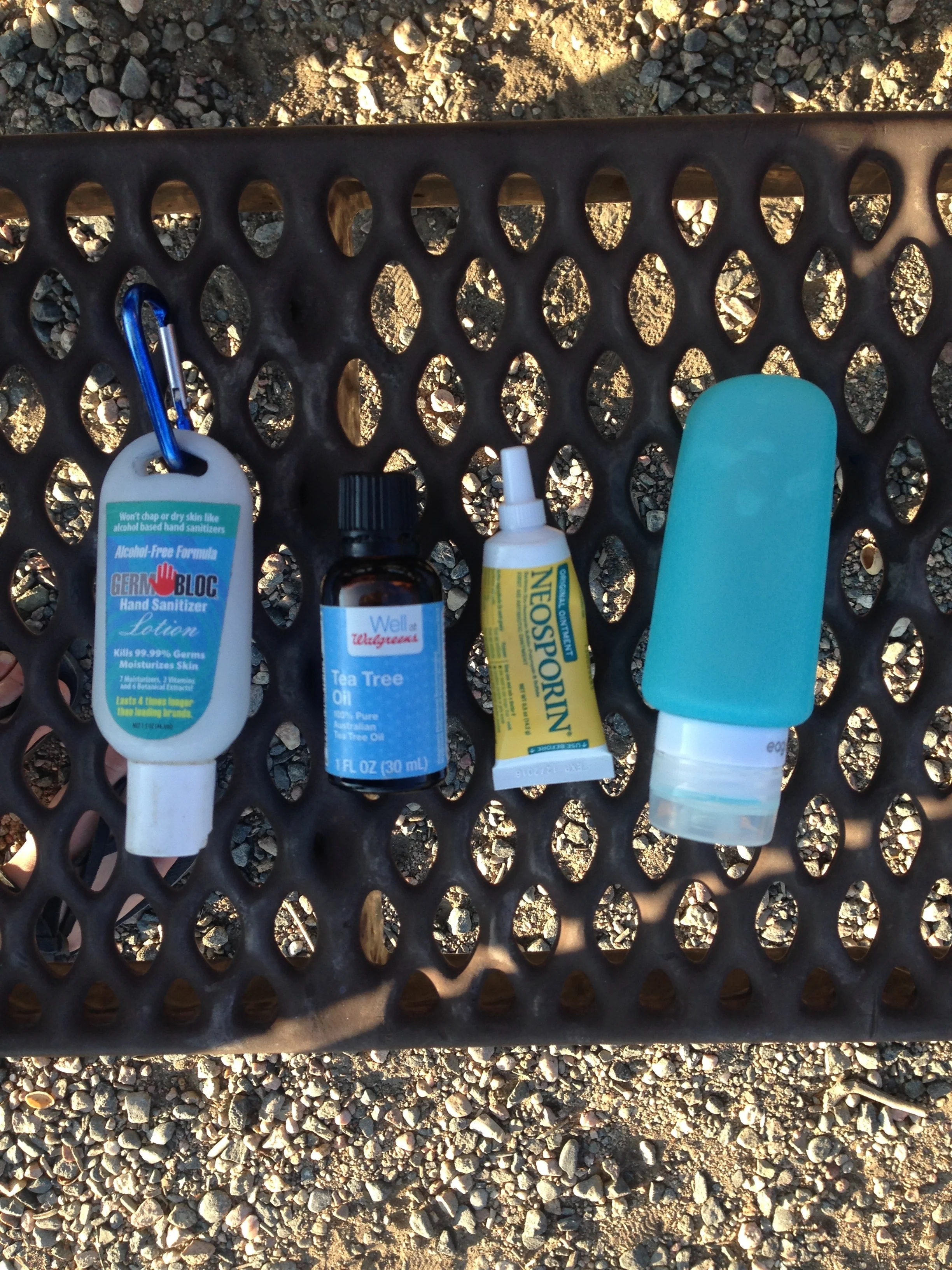 Alcohol based hand sanitizer works for other parts of the body in a pinch, tea tree oil and neosporine are good for saddle sores, and Dr. Bronner's (shown here in a soft bottle) is a good, mild, soap for cleaning yourself and your clothes. 