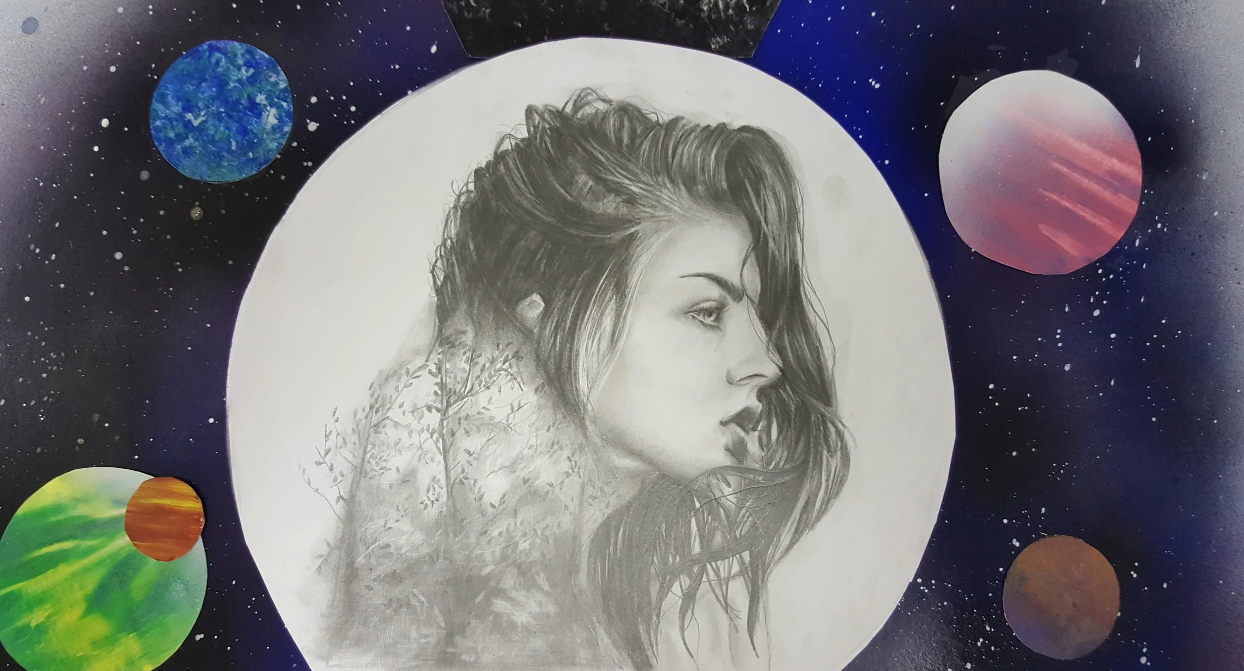 Anjali showed her patience and amazing skill when rendering this portrait during her portfolio prep classes… she then combined the graphite portrait with other media for a collage … breathtaking detail!