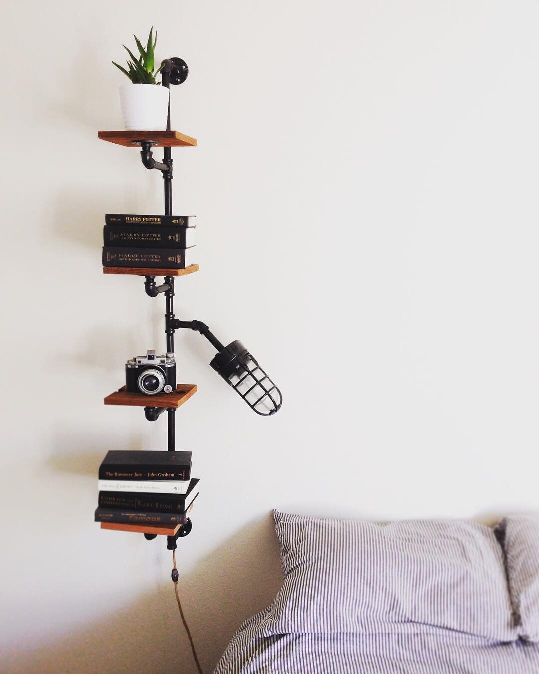 Need a bookshelf and reading light? Handmade shelf with light. Light has a switch on the rope wrapped cable. 
Size:
Materials: metal piping, repurposed wood, light bulb (not included) 
Price: $200
SOLD
#repurpose #furniture #reading