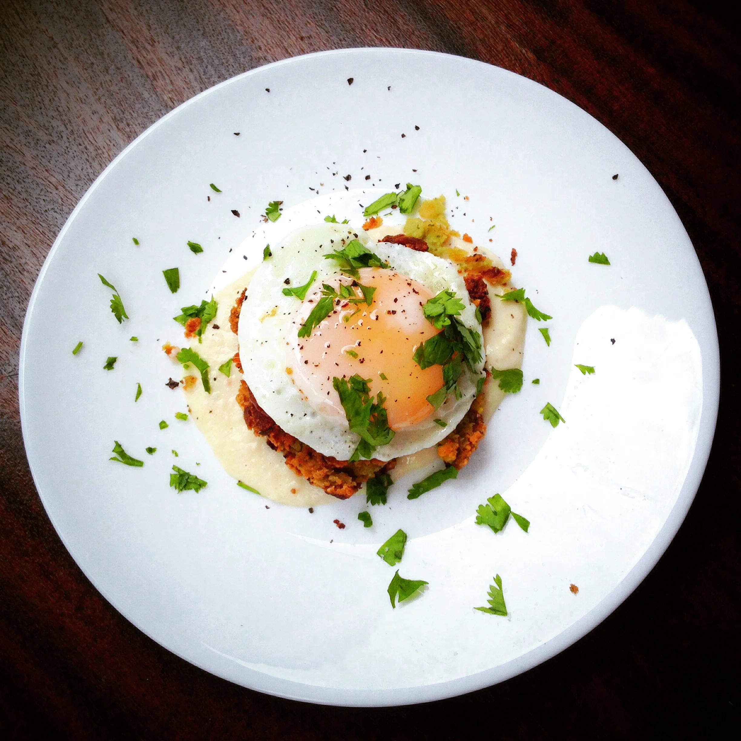 fried egg with roast garlic sauce and falafel
