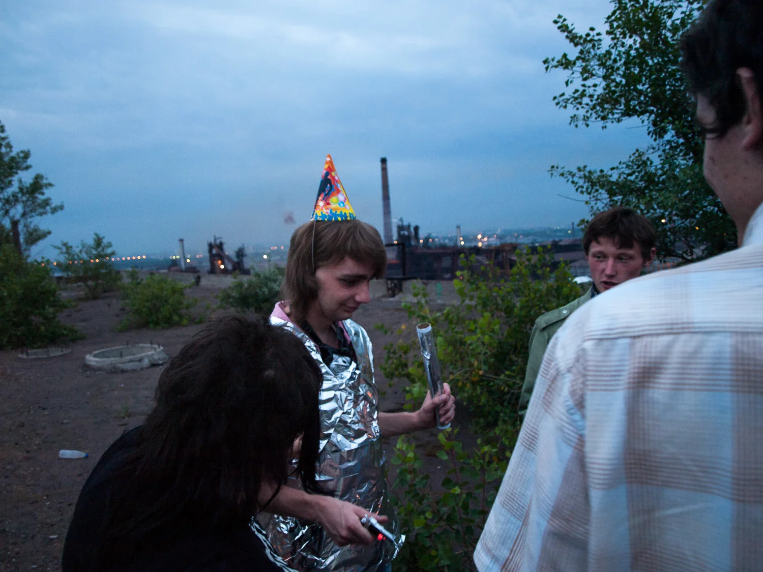 Young people celebrate a birthday on a factory roof in the industrial zone of Dnipropetrovsk, east Ukraine.