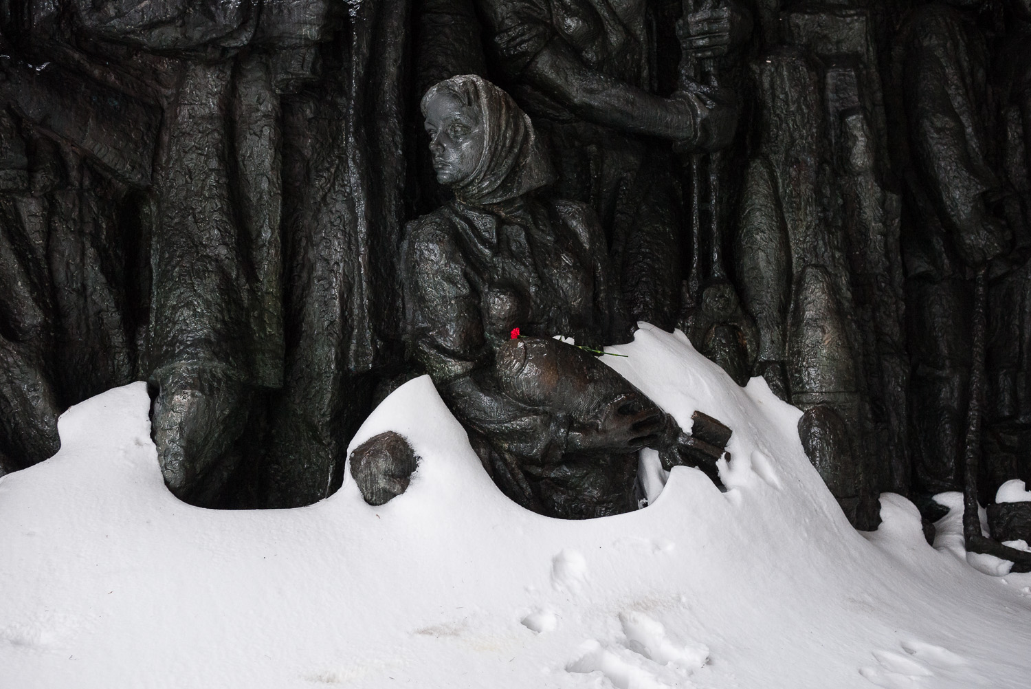  A flower is left on a Soviet­-era monument to those who defended Kyiv during the Second World War in the city’s Museum of the Great Patriotic War. 