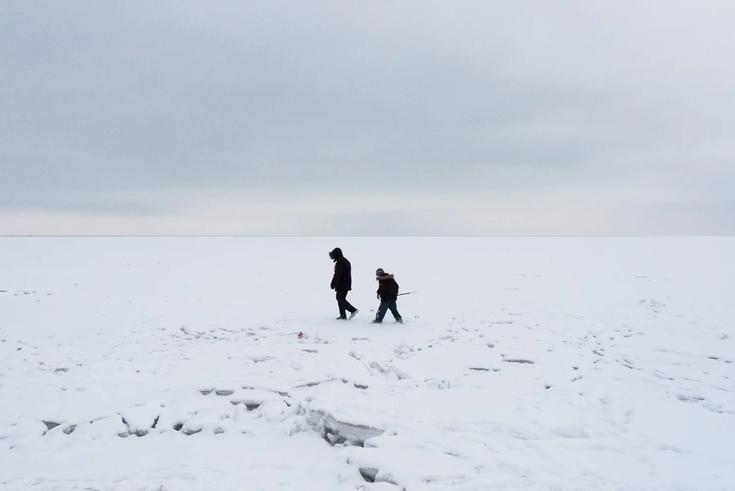 Boys walk on the frozen Azov Sea near the city of Mariupol.