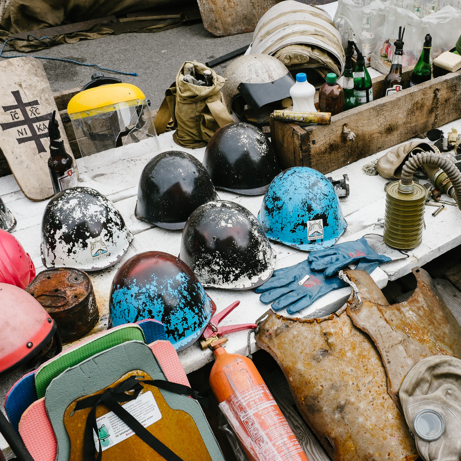  A display of helmets, shields and other items on Khreshchatyk, the main street running through Kyiv's Independence Square, and a site of protest since the beginning of the Euromaidan uprisings in November 2013. 