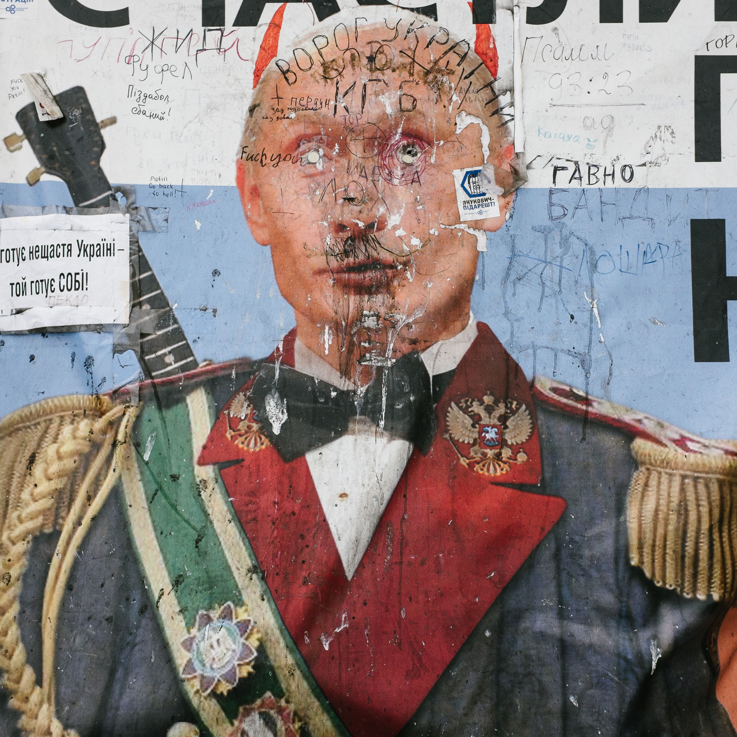  A defaced poster of Russian president Vladimir Putin on Kyiv's Independence Square, April 2014. 